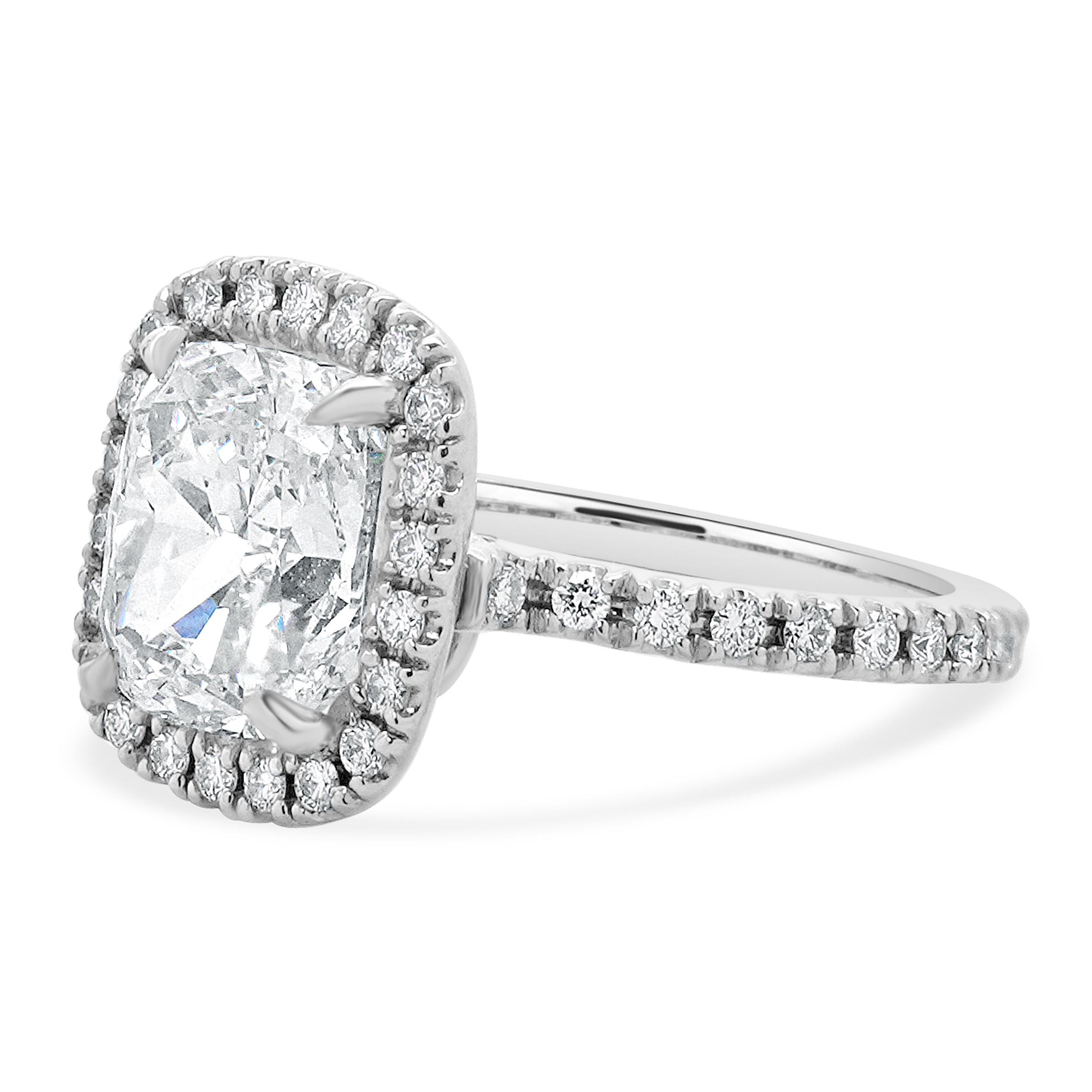 Material: Platinum
Center Diamond: cushion cut = 3.25ct
Color: H
Clarity: SI1
GIA: 6137249250
Diamonds: 40 round cut = 0.40cttw
Color: H
Clarity: SI1
Ring Size: 5 (please allow up to 2 additional business days for sizing requests)
Dimensions: ring