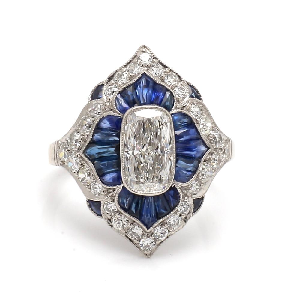 Women's Platinum Cushion Cut Diamond Ring with Sapphire Accents For Sale