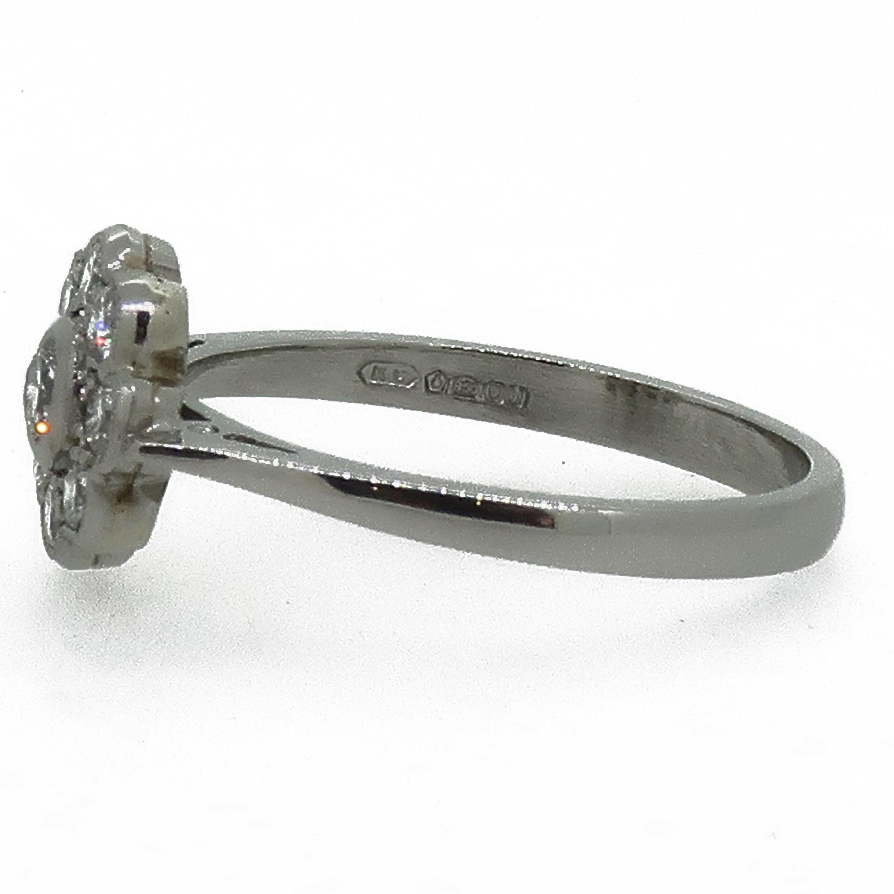 Platinum Diamond Art Deco Style Cluster Ring

A traditional style nine stone brilliant cut diamond cluster ring. Consisting of a slightly larger central stone, surrounded by a further eight brilliant cut diamonds, all delicately set in a grain