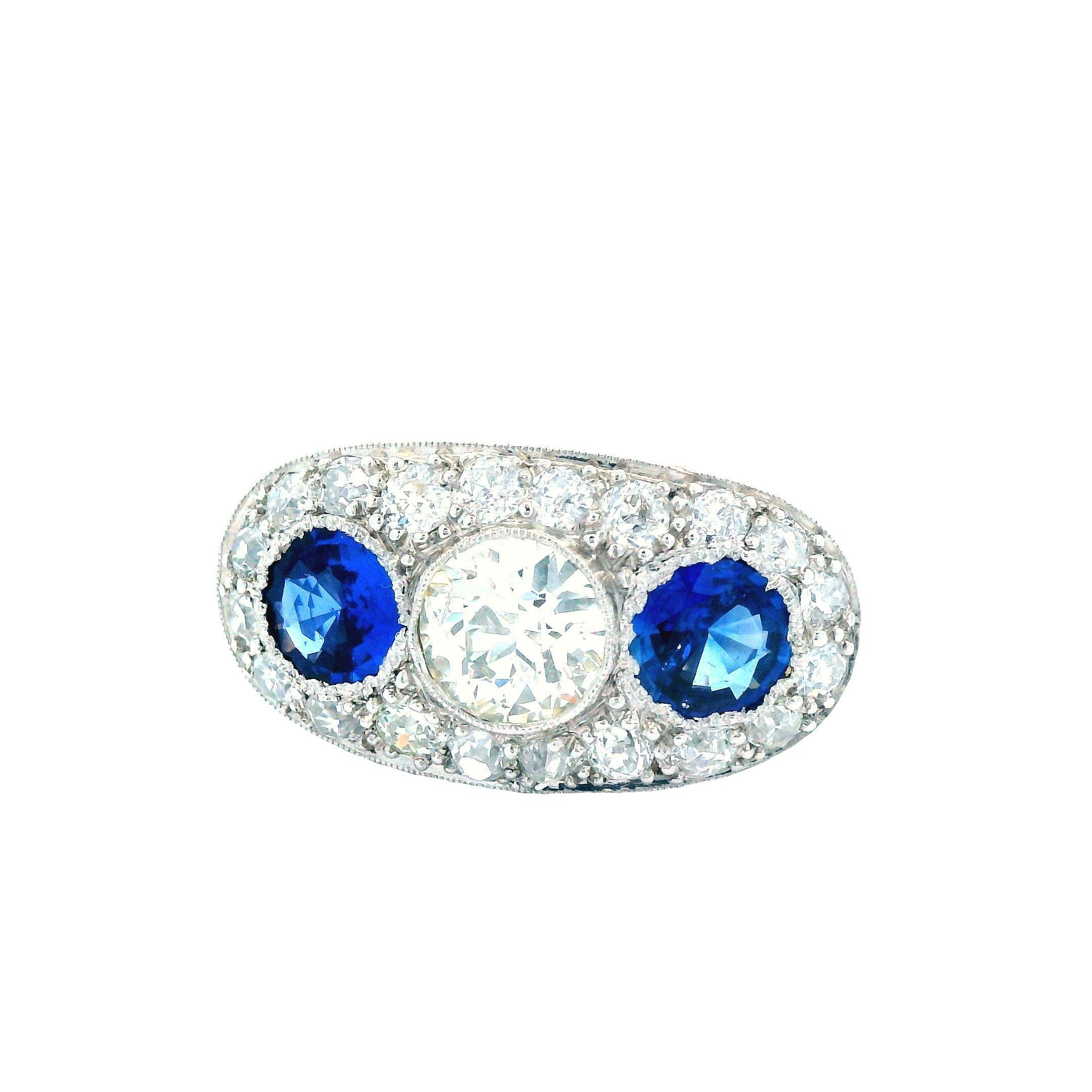 Round Cut Platinum Deco Diamond and Blue Sapphire 3 Stone Ring For Sale