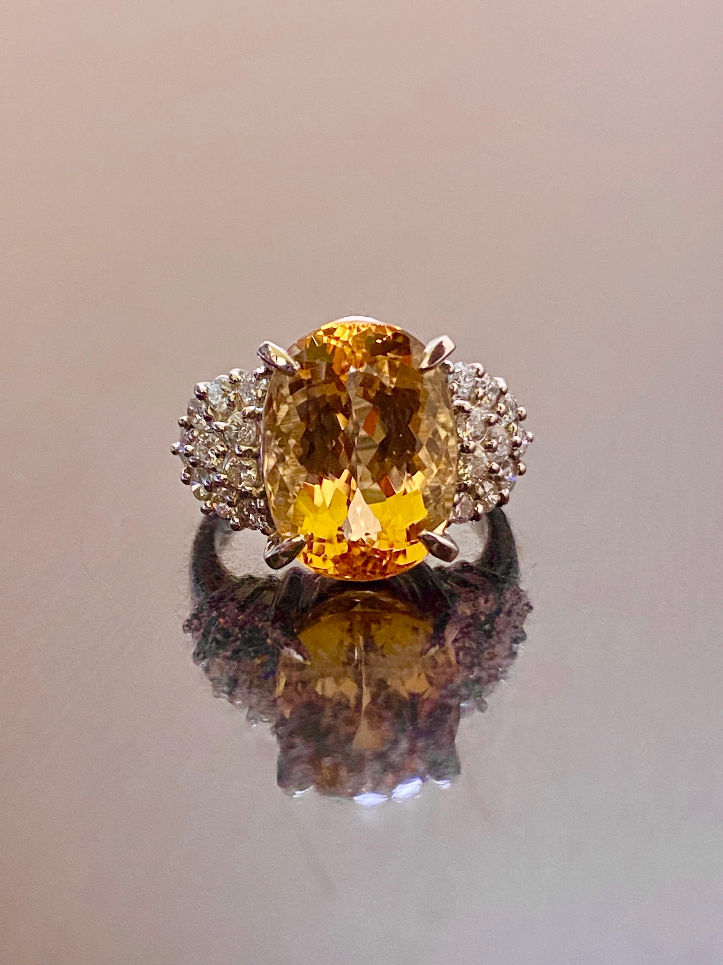 DeKara Designs Classic

Metal- 90% Platinum, 10% Iridium.

Stones- 1 Oval Imperial Topaz 8.88 Carats, 20 Round Diamonds G-H Color VS2-SI1 Clarity 0.72 Carats.

Size- 6. FREE SIZING!!!!

Ring is currently getting certified by GIA.

One of a Kind
