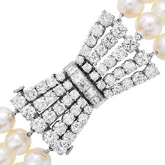 Platinum Diamond Akoya Pearl Bow Clasp Three Strand Bracelet
