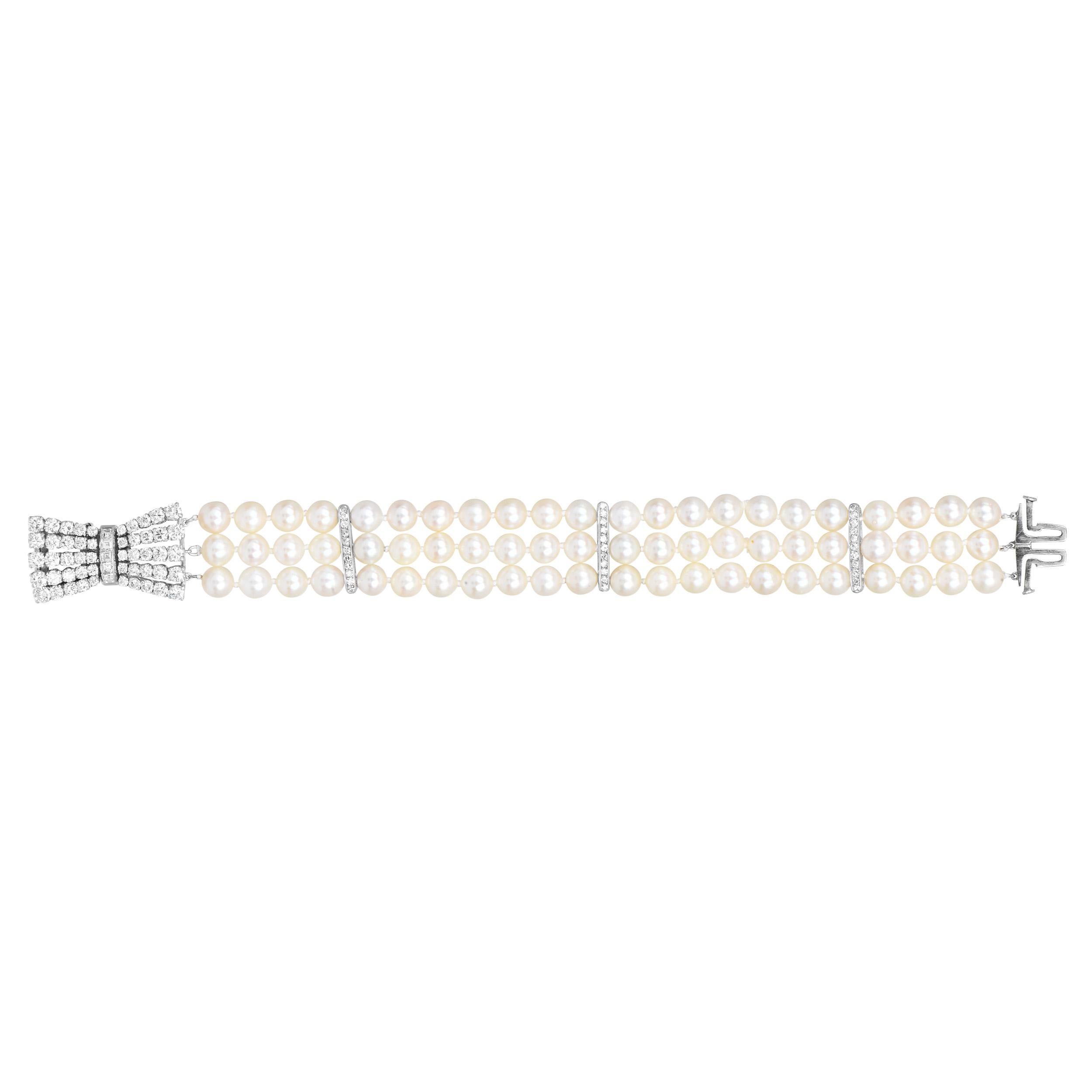 Platinum Diamond Akoya Pearl Bow Clasp Three Strand Bracelet For Sale 1