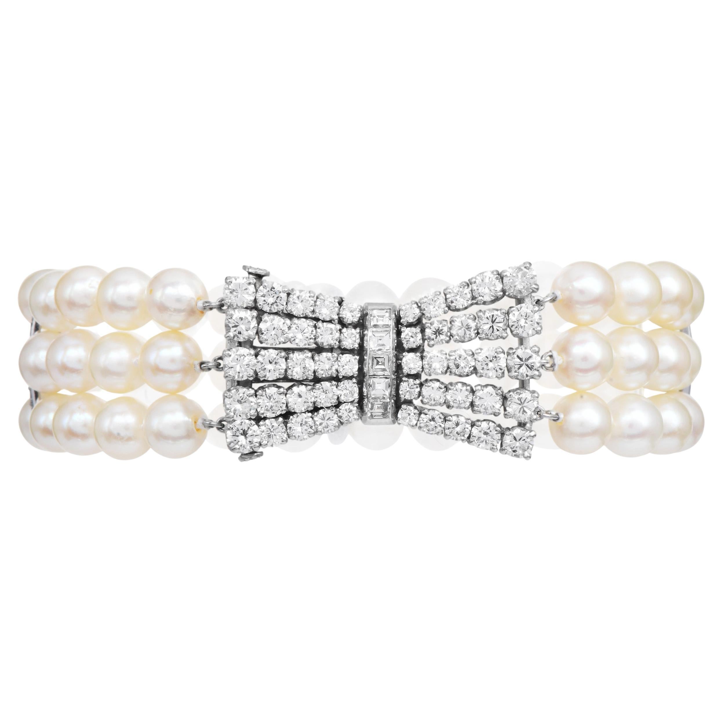 Platinum Diamond Akoya Pearl Bow Clasp Three Strand Bracelet For Sale