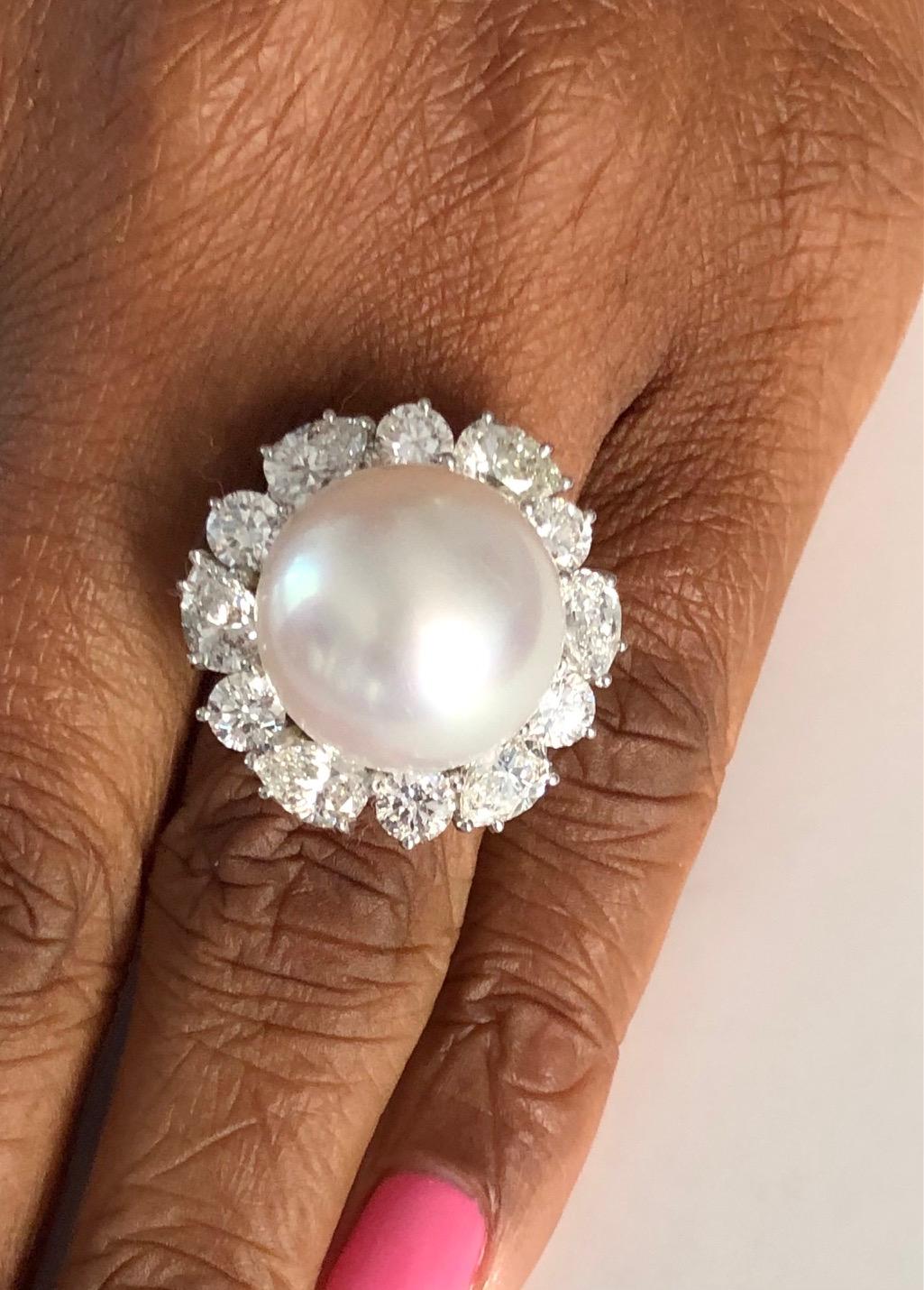 This fantastic quality handmade Ring is a very rare piece, made with the 12 Diamonds 4.79 carats of the highest quality and an excellent quality Round South Sea Pearl 16.2mm.

We design and manufacture our jewelry in our workshop, located in New