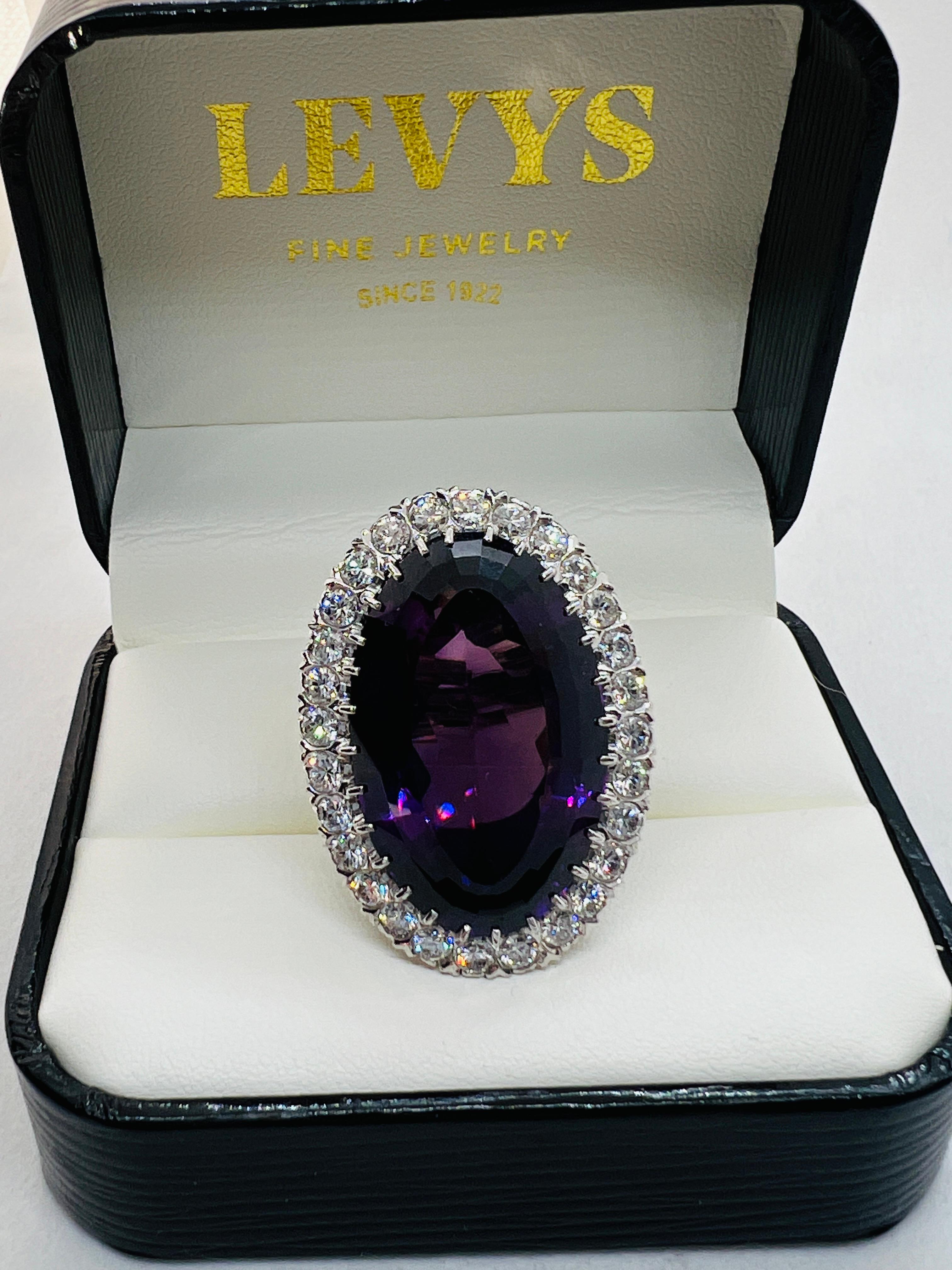 Platinum, Diamond and 40 Carat Oval Amethyst Ladies Cocktail Ring Size 5.75 In Excellent Condition For Sale In Birmingham, AL