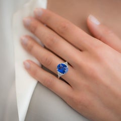 Platinum, Diamond and 5.51 Carat Oval Ceylon Blue Sapphire Cocktail Ring