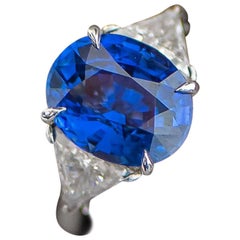 Platinum, Diamond and 5.51 Carat Oval Ceylon Blue Sapphire Cocktail Ring