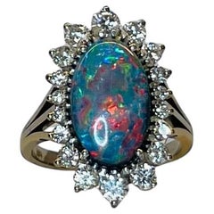 Retro Platinum Diamond and Black Opal Ring