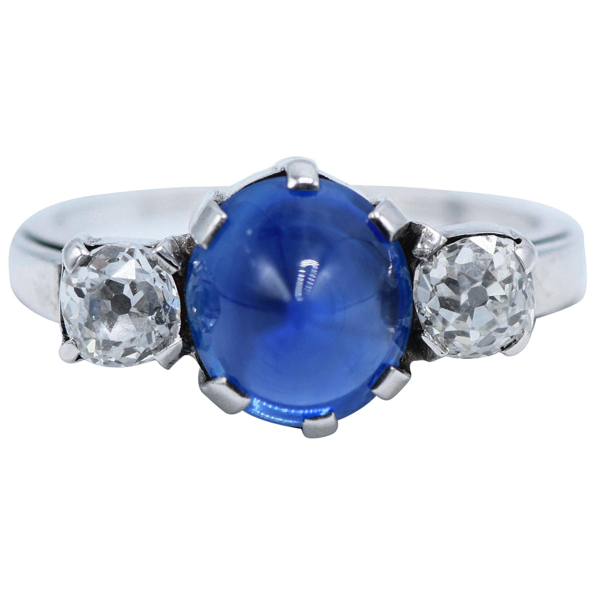 Platinum, Diamond and Blue Cabochon Sapphire Ring For Sale