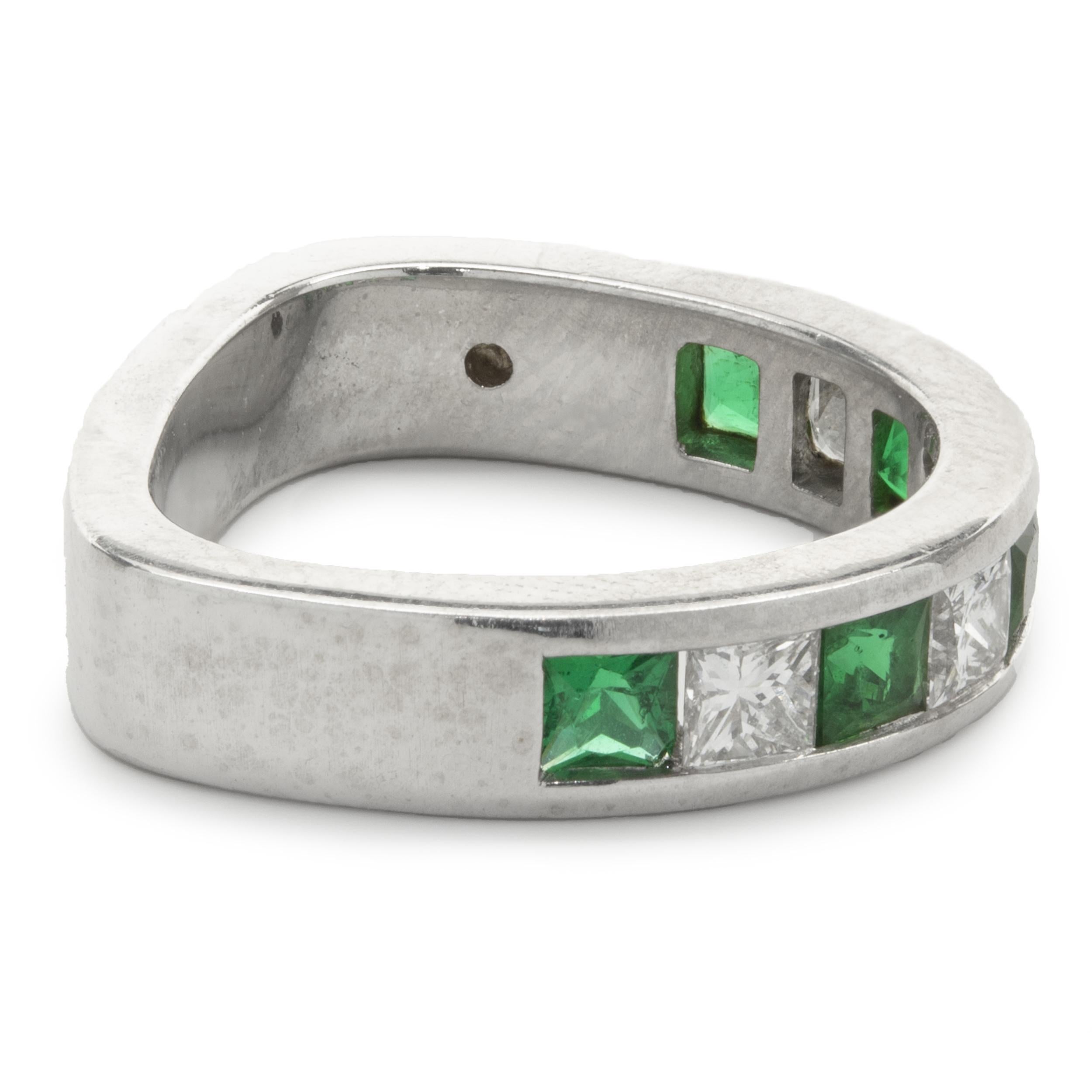 Designer: custom
Material: platinum
Emerald: 5 princess cut
Diamond: 4 princess cut = 0.61cttw
Color: D/F
Clarity: VS1-2
Dimensions: ring top measures 4.63mm wide
Ring Size: 4.75 (complimentary sizing available)
Weight: 9.52 grams