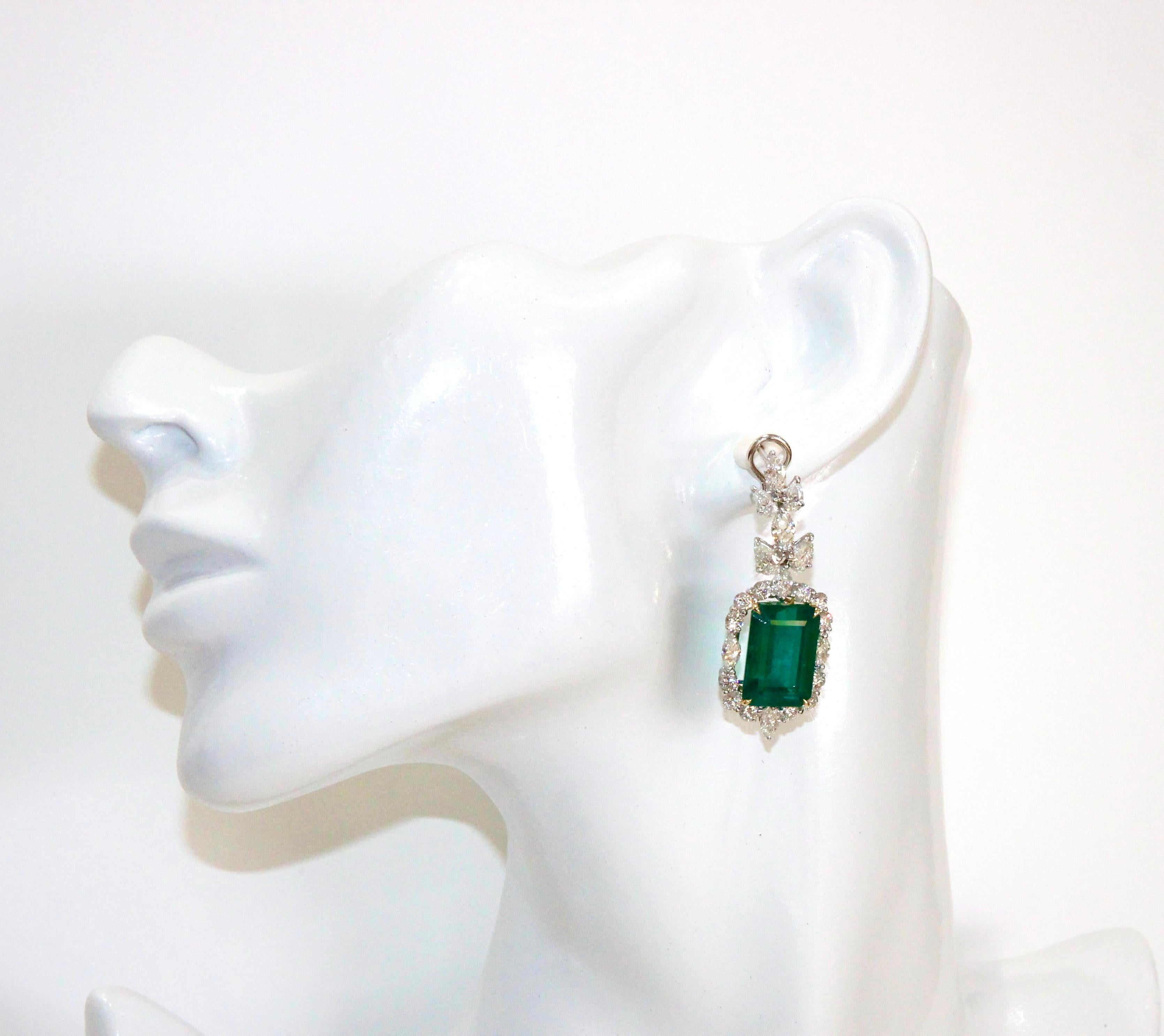 Platinum Diamond and Emerald Drop Earrings.
Emeralds :25.90ctws GIA Certified 
Diamonds:7.50ctws   
Retail $240,000.00                 