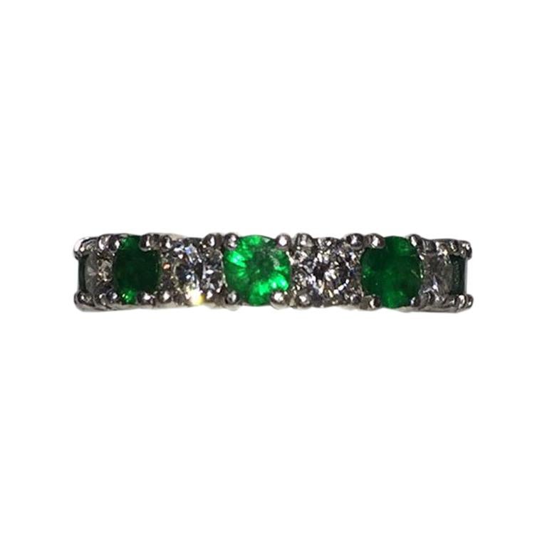 Platinum Diamond and Emerald Eternity Band For Sale