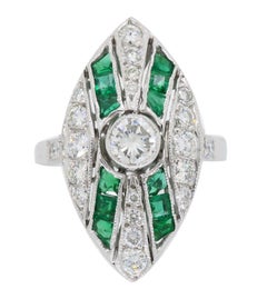 Platinum Diamond and Emerald Navette Style Ring
