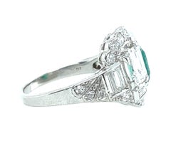 Platinum Diamond and Emerald Toi Et Moi 1950s Ring