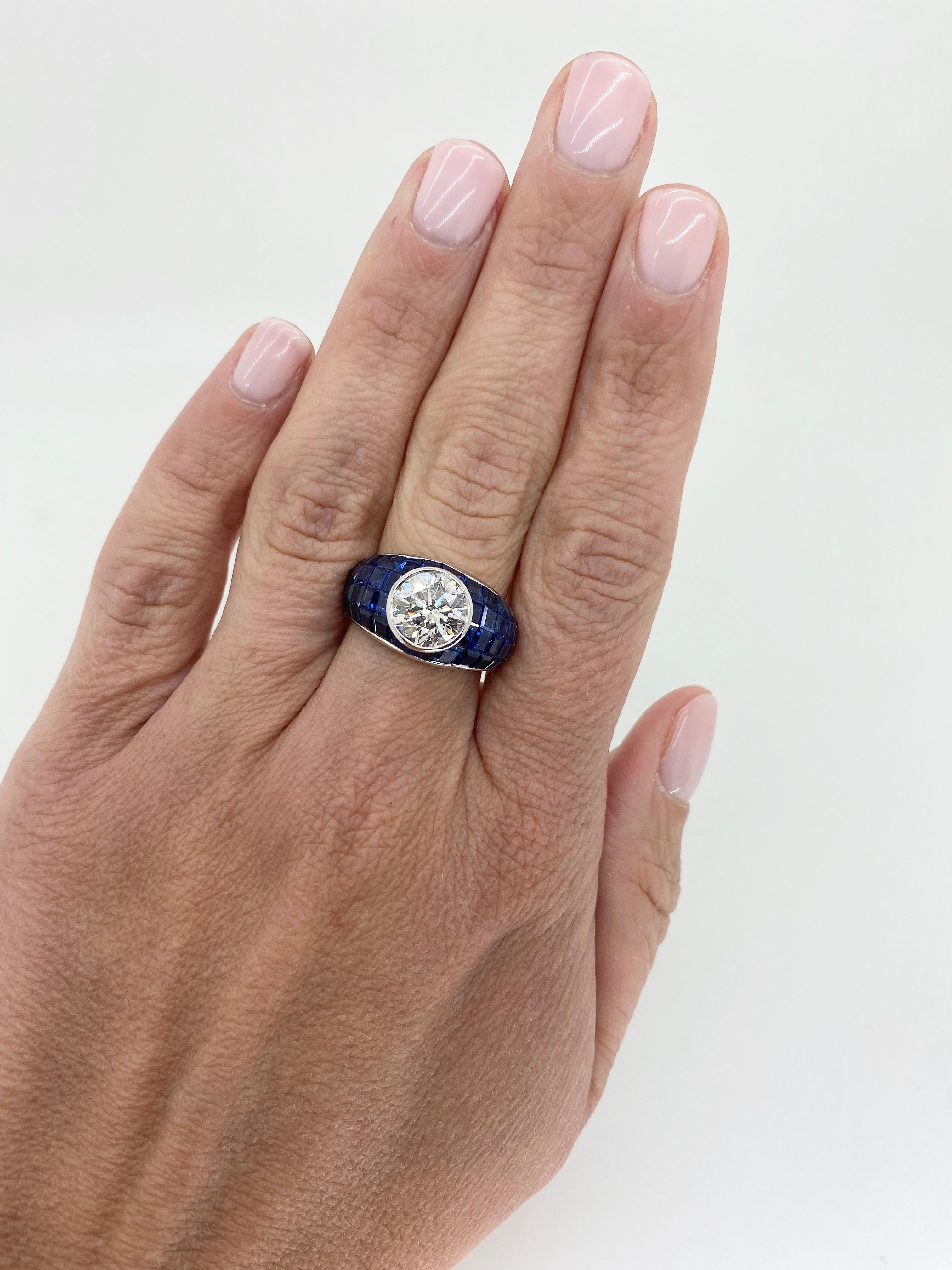 Ring aus Platin mit blauem Saphir und unsichtbar gefasstem Platin im Angebot 6