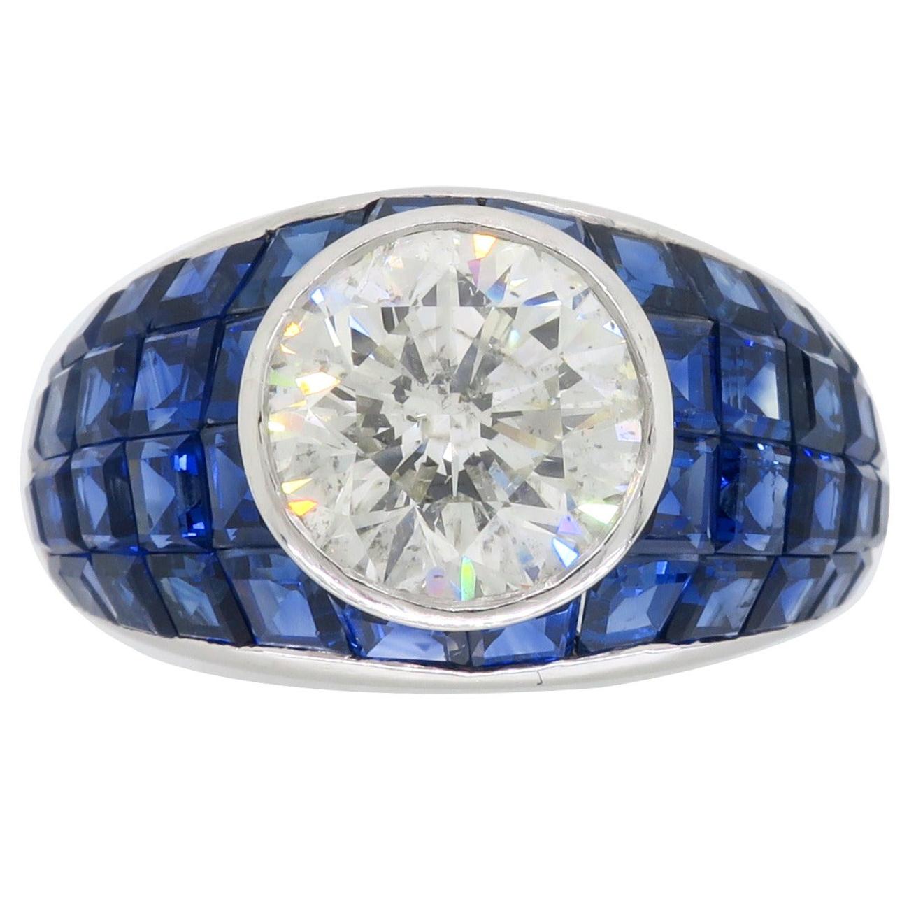 Platinum Diamond and Invisible Set Blue Sapphire Ring