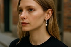 Boucles d'oreilles pendantes en platine avec diamant et poire de 1 pouce de long