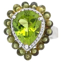 Anillo cóctel de platino, diamantes y peridoto