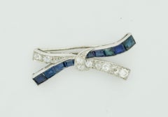 Platinum Diamond and Sapphire Bow Brooch, circa 1920s