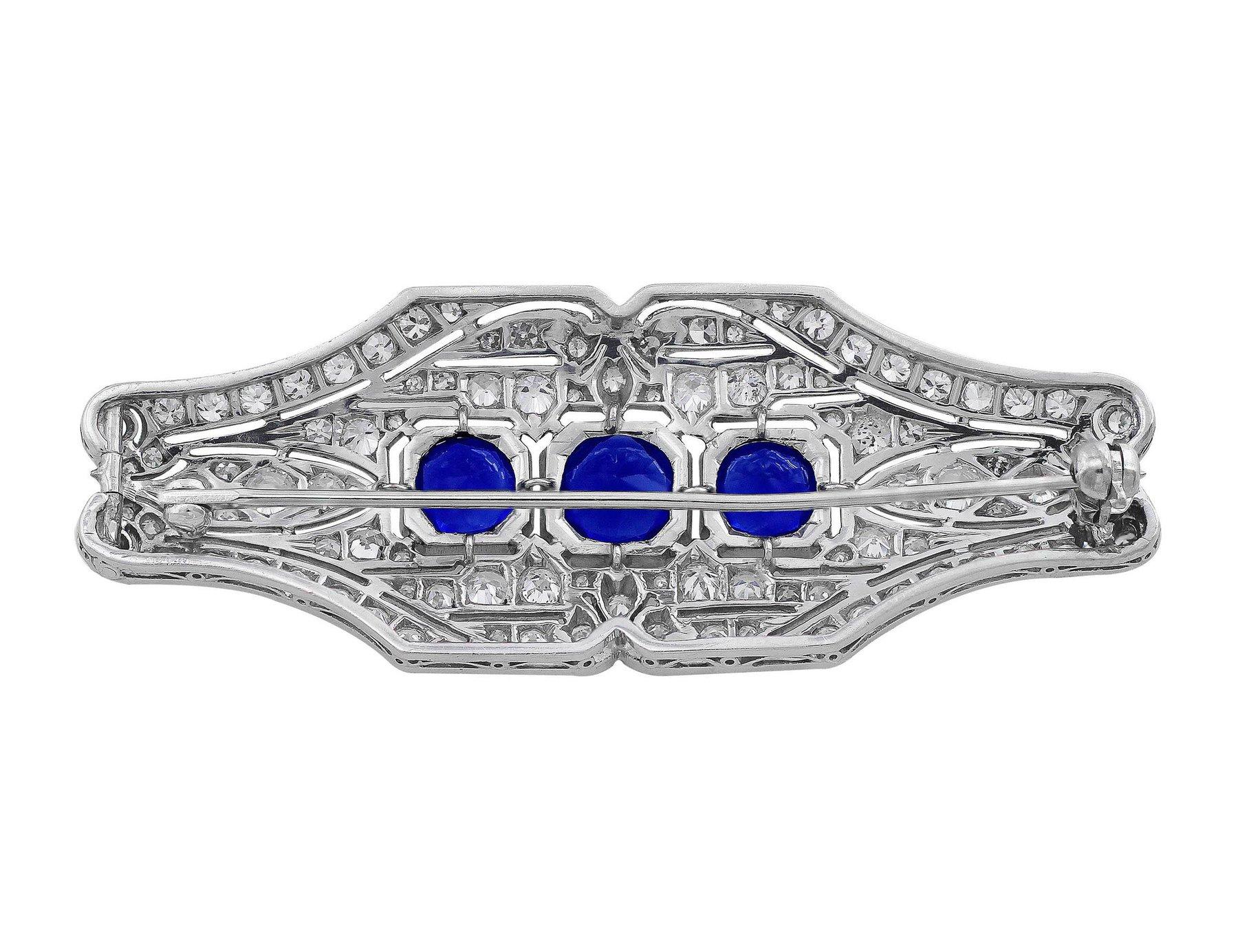 Platinum diamond and sapphire brooch. The three sapphires are approximately 2.55ctw and diamonds 2.00ctw.