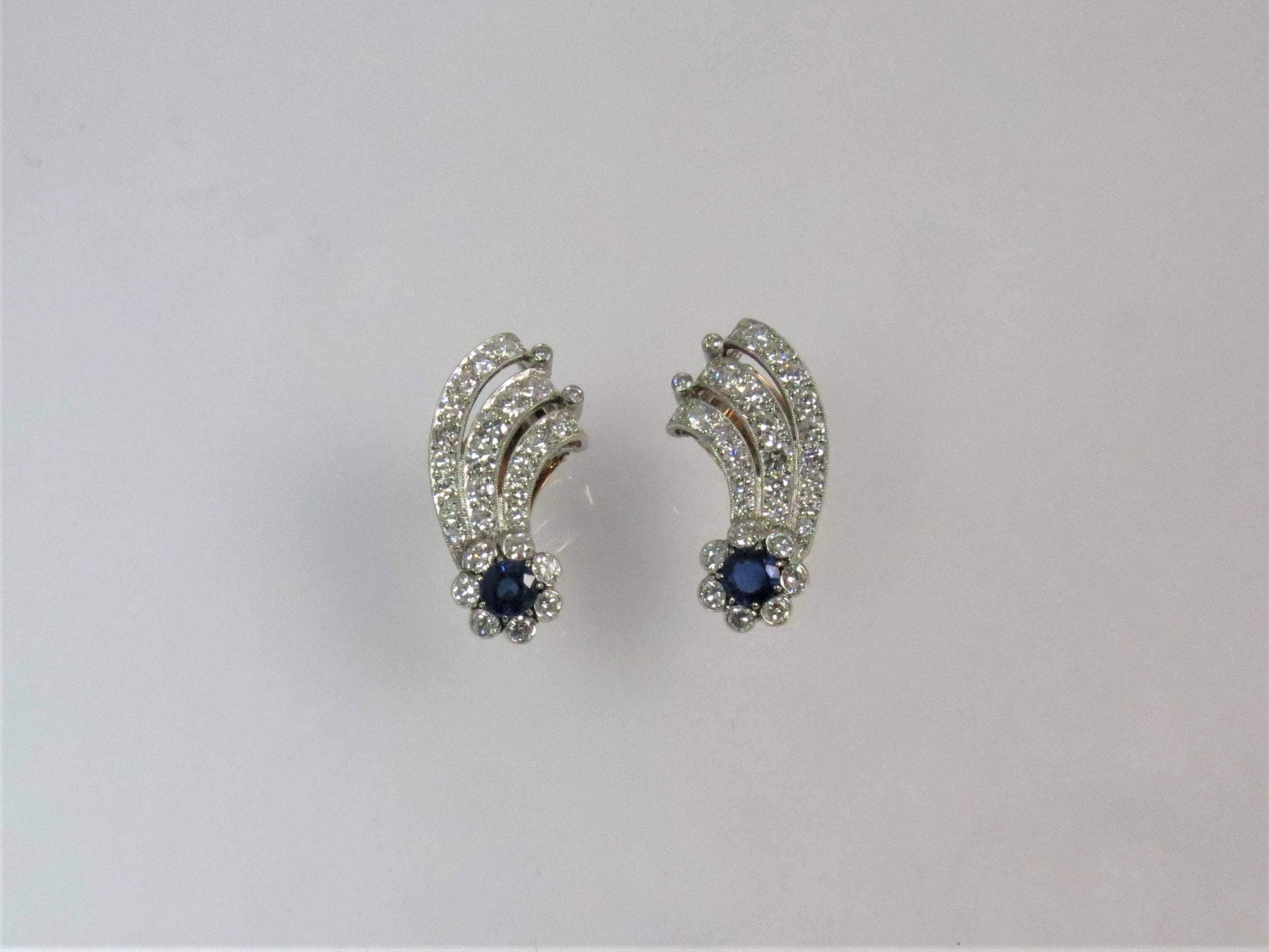Contemporary Platinum Diamond and Sapphire Ear Clips For Sale