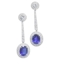 Platinum, Diamond and Sapphire Earrings by Pierre/Famille, Inc.