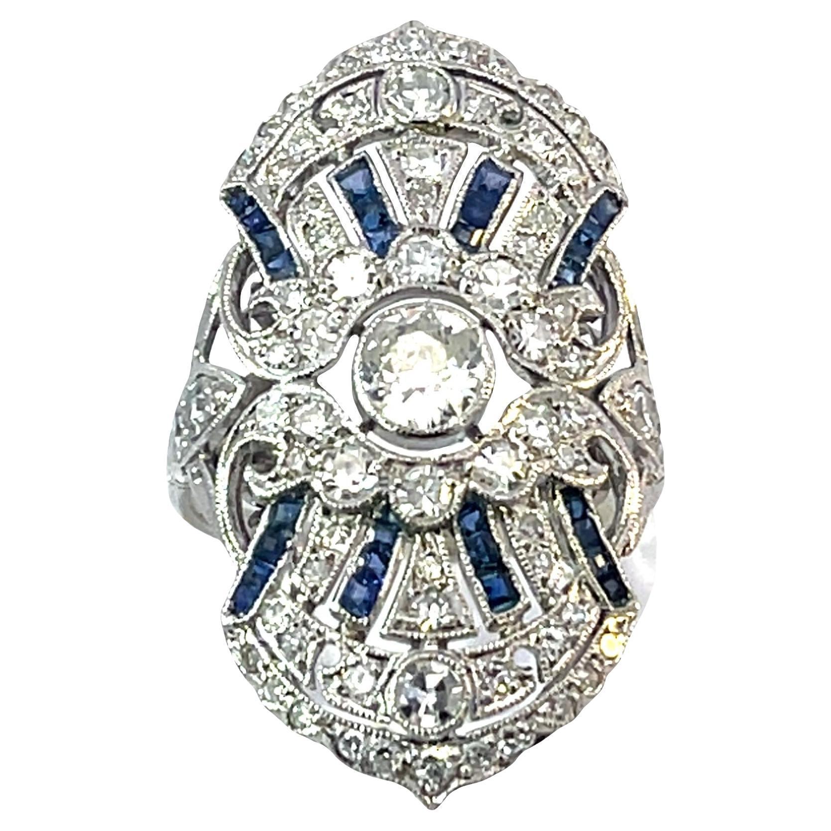 Anello Oyster in platino con diamanti e zaffiri - 6,8g