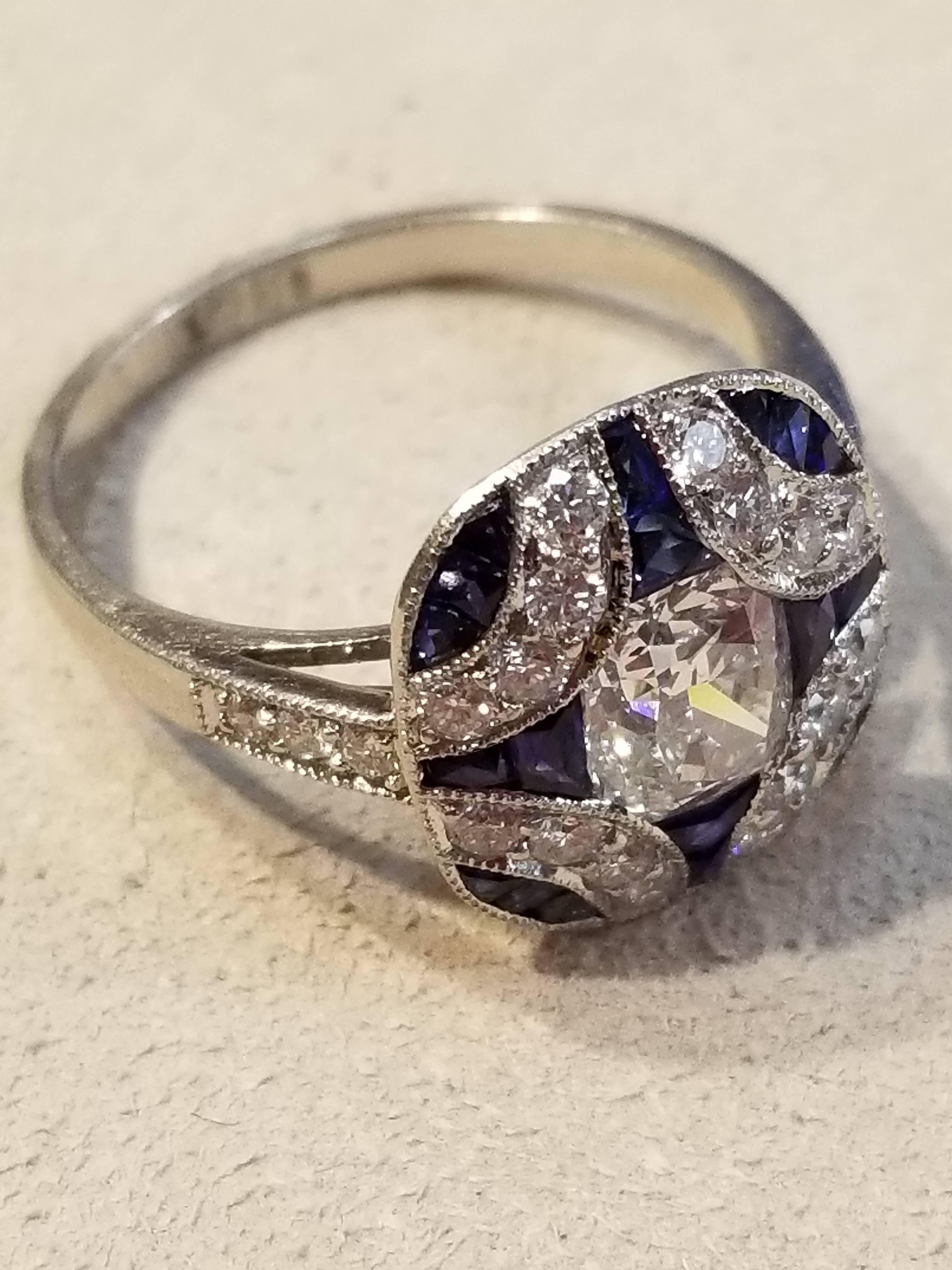 Round Cut Platinum Diamond and Sapphire Ring For Sale