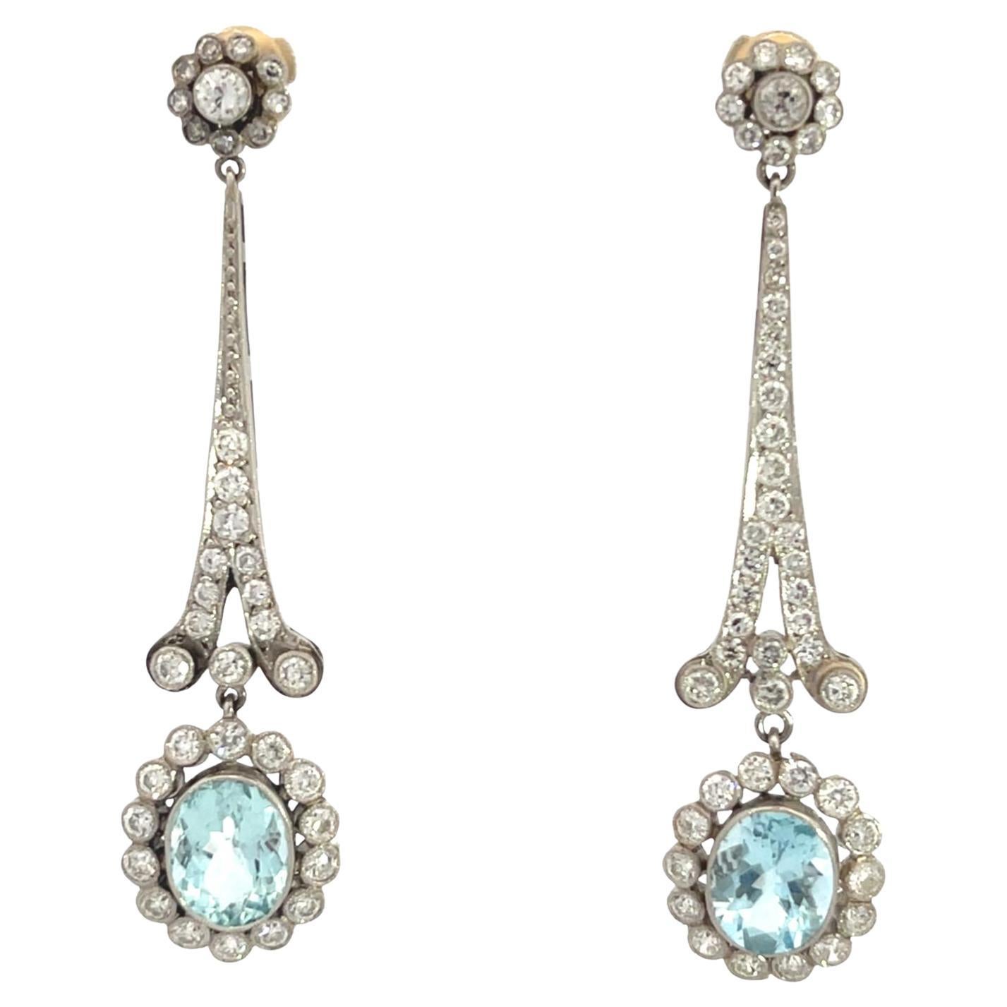 Orecchini lunghi in platino con diamante e acquamarina