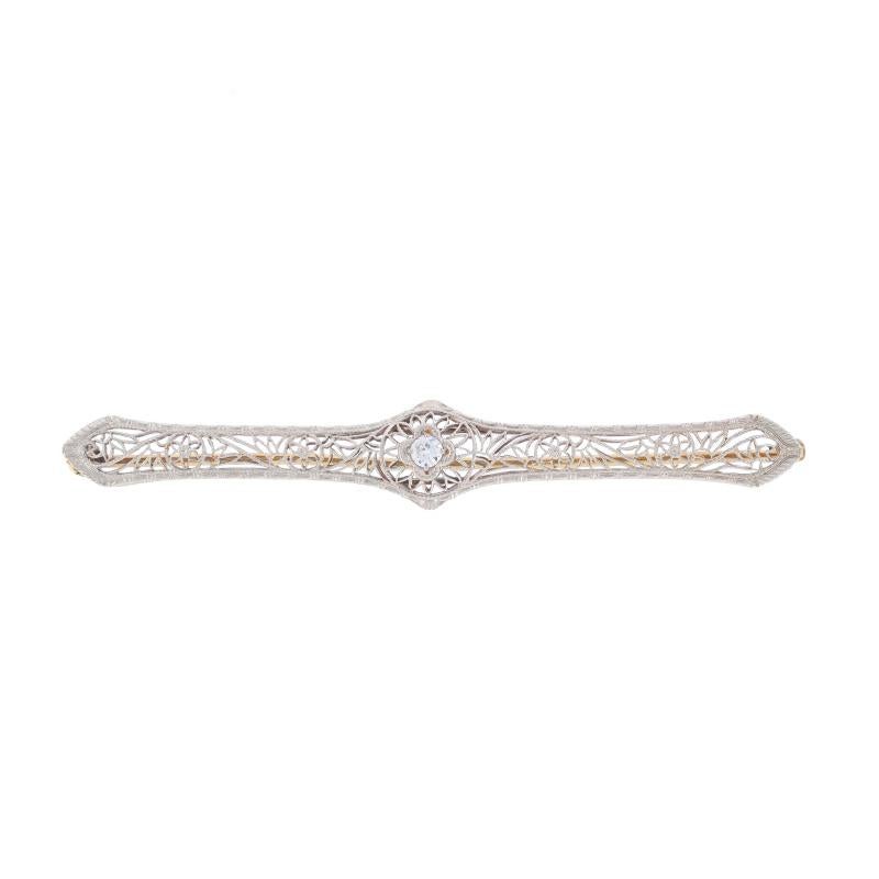 Era: Art Deco
Date: 1920s - 1930s

Metal Content: Platinum & 14k Yellow Gold

Stone Information

Natural Diamond
Carat(s): .08ct
Cut: European
Color: G
Clarity: VS1

Style: Solitaire Bar Brooch
Fastening Type: Hinged Pin and Locking C-Clasp
Theme: