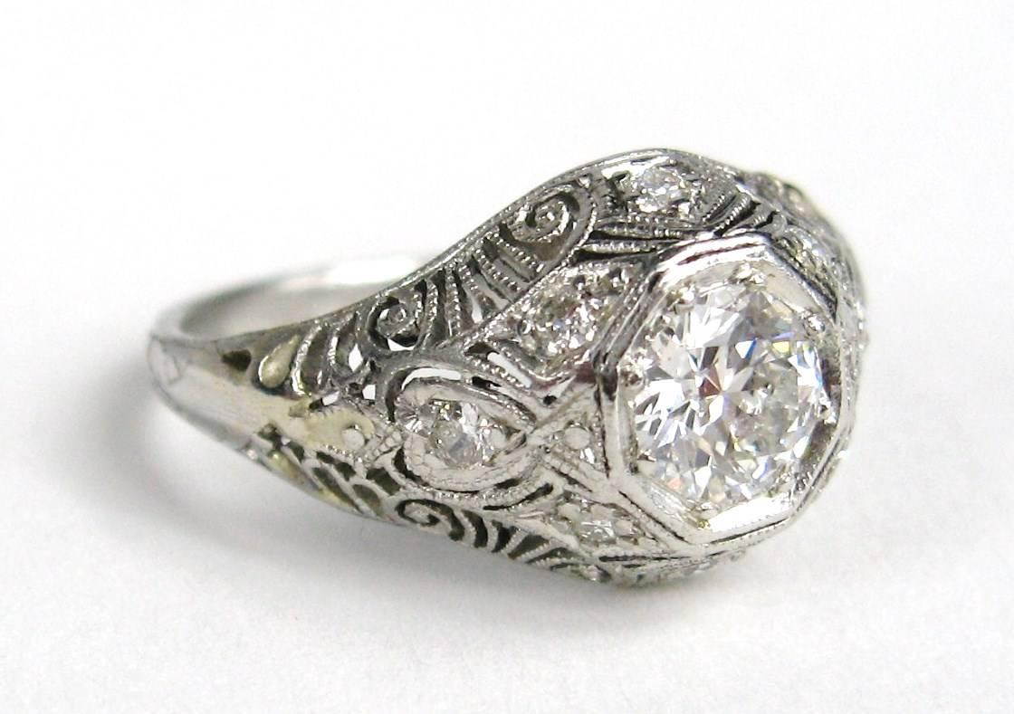 Lovely Platinum diamond Filigree Engagement ring. Old European cut .53 Ct center stone. VVS-2  Color G Measuring 5.20 x 3.08. Handcrafted in. Platinum containing 8 side Round brilliant cut diamonds. Appraisal comes with the ring. This is out of a