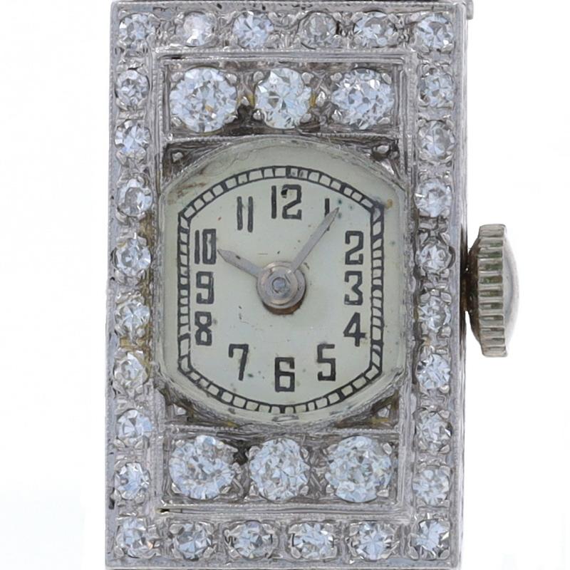 Marque : Wittnauer
Mouvement : Manuel
Nombre de Jewell : 17
Garantie : Un an
Époque : Art déco
Date : années 1920 - années 1930
Couleur du cadran : Argent

Contenu en métal : 90% Platine, Or blanc 18k, et Or blanc 14k
Note sur les métaux : (fond de
