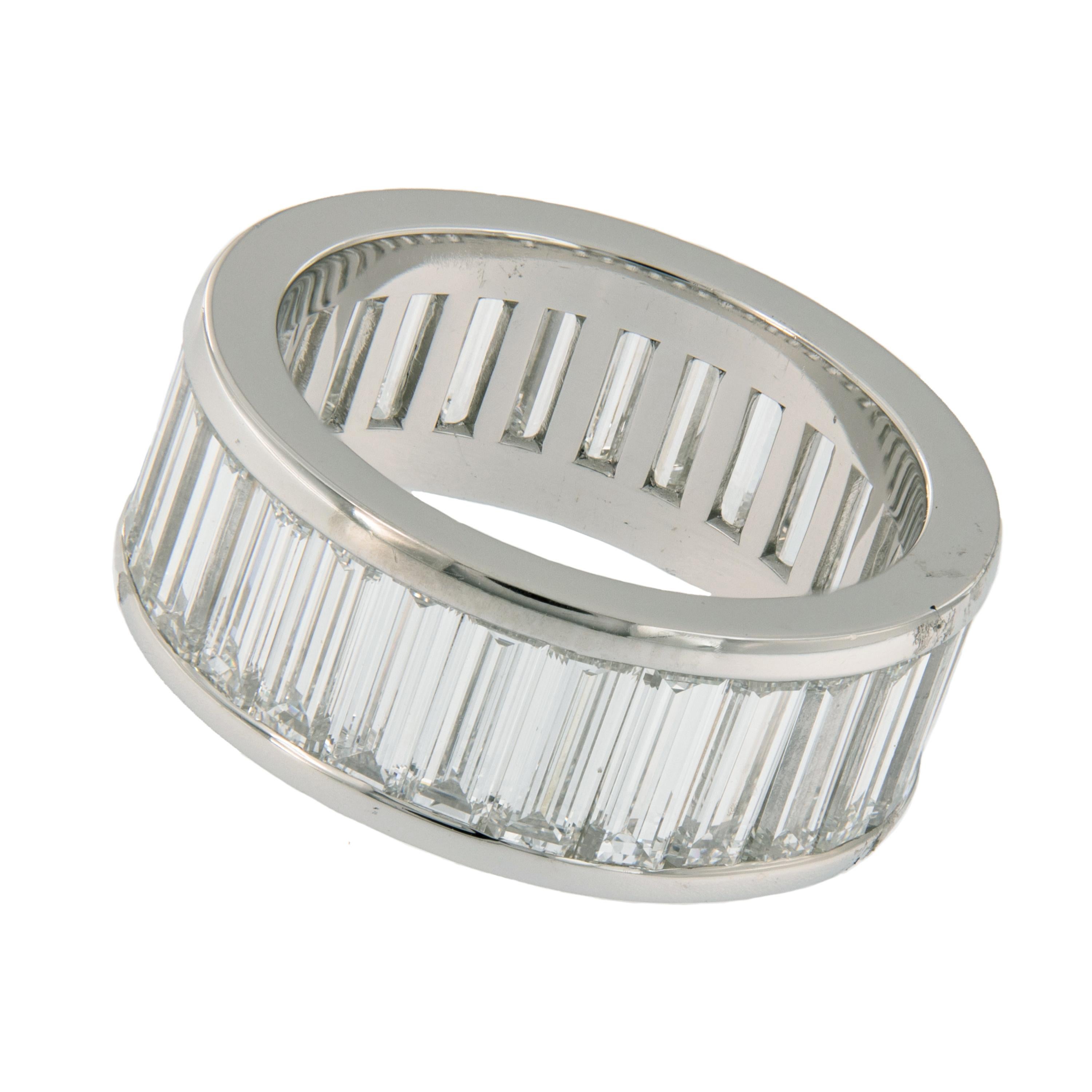 Beautiful, perfectly matched baguette diamond eternity band hand-fabricated in platinum with 6.31 carats in diamonds. Ring size 5.75. Weighs 10.1 grams. Marked W.R Designs.

Diamonds 6.31 Cttw VVS, D-F