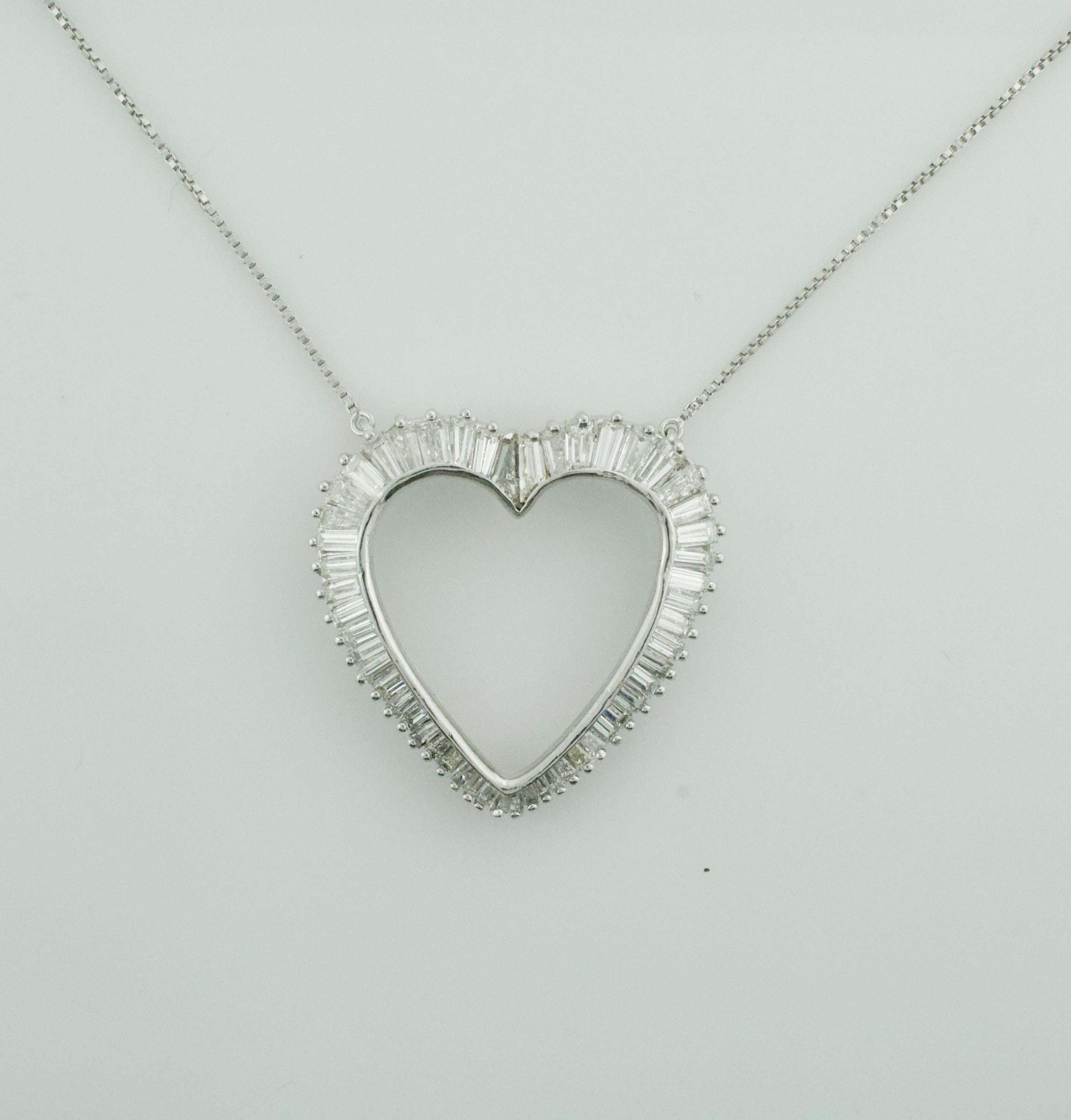 💖 Discover Timeless Romance: Platinum Diamond Baguette Heart Necklace 💖

Step into a world of vintage elegance with our exquisite Platinum Diamond Baguette Heart Necklace, a stunning piece reminiscent of the glamour and romance of the 1960s.