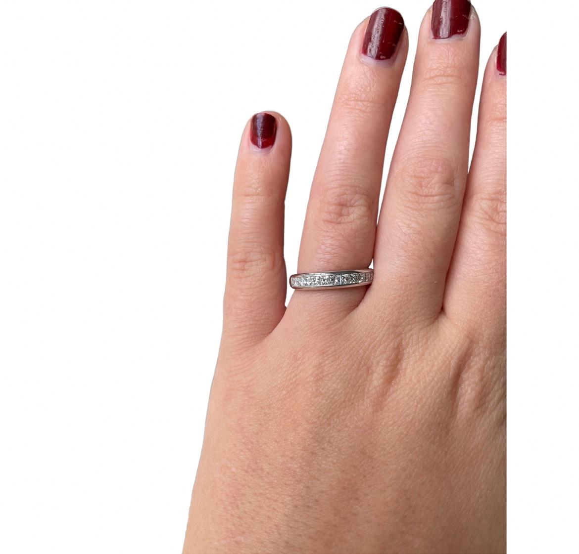 You'll love wearing this simple but classic diamond band. This elegant ring is 0.77 ctw of dazzling princess cut diamonds with VS-SI clarity and G-H color. These gorgeous diamonds are set in six grams of platinum. Perfect to wear as a wedding band,