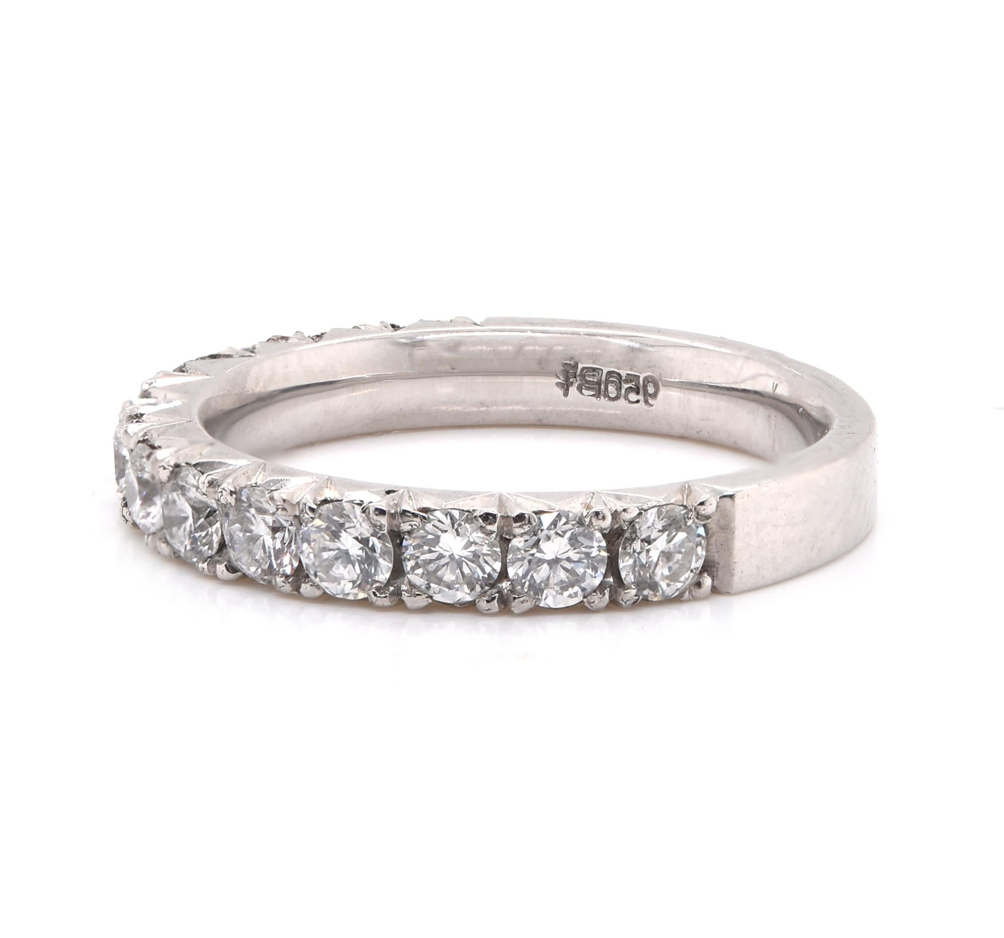 Designer: Custom
Material: platinum
Diamonds: 13 round brilliant cut = 1.00cttw
Color: G
Clarity: VS2
Size: 5.25
Dimensions: ring measures 3mm in width
Weight: 4.73 grams
