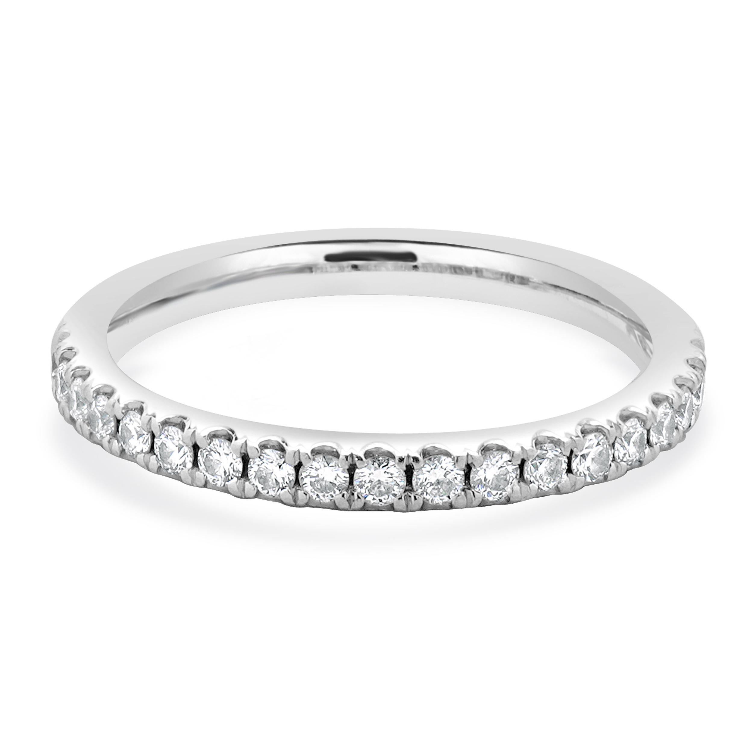 Designer: custom
Material: Platinum
Diamond: 19 round brilliant cut = 0.38cttw
Color: G/ H
Clarity: VS1
Ring size: 4.75 (please allow two additional shipping days for sizing requests)
Weight: 3.33 grams