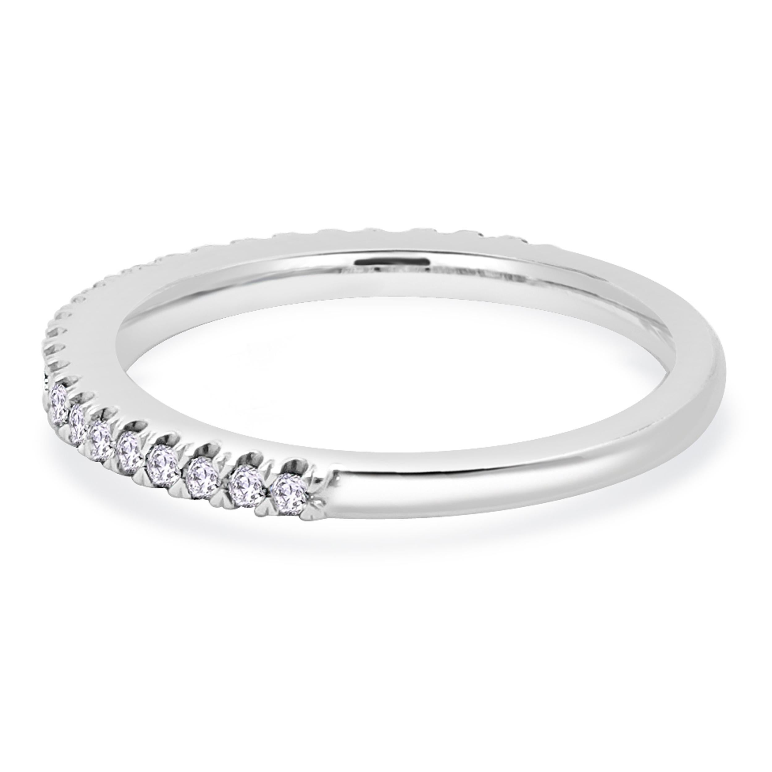 Designer: custom
Material: platinum
Diamond: 25 round brilliant cut = 0.15cttw
Color: G
Clarity: SI1
Ring size: 4.5 (please allow two additional shipping days for sizing requests)
Weight: 2.86 grams
