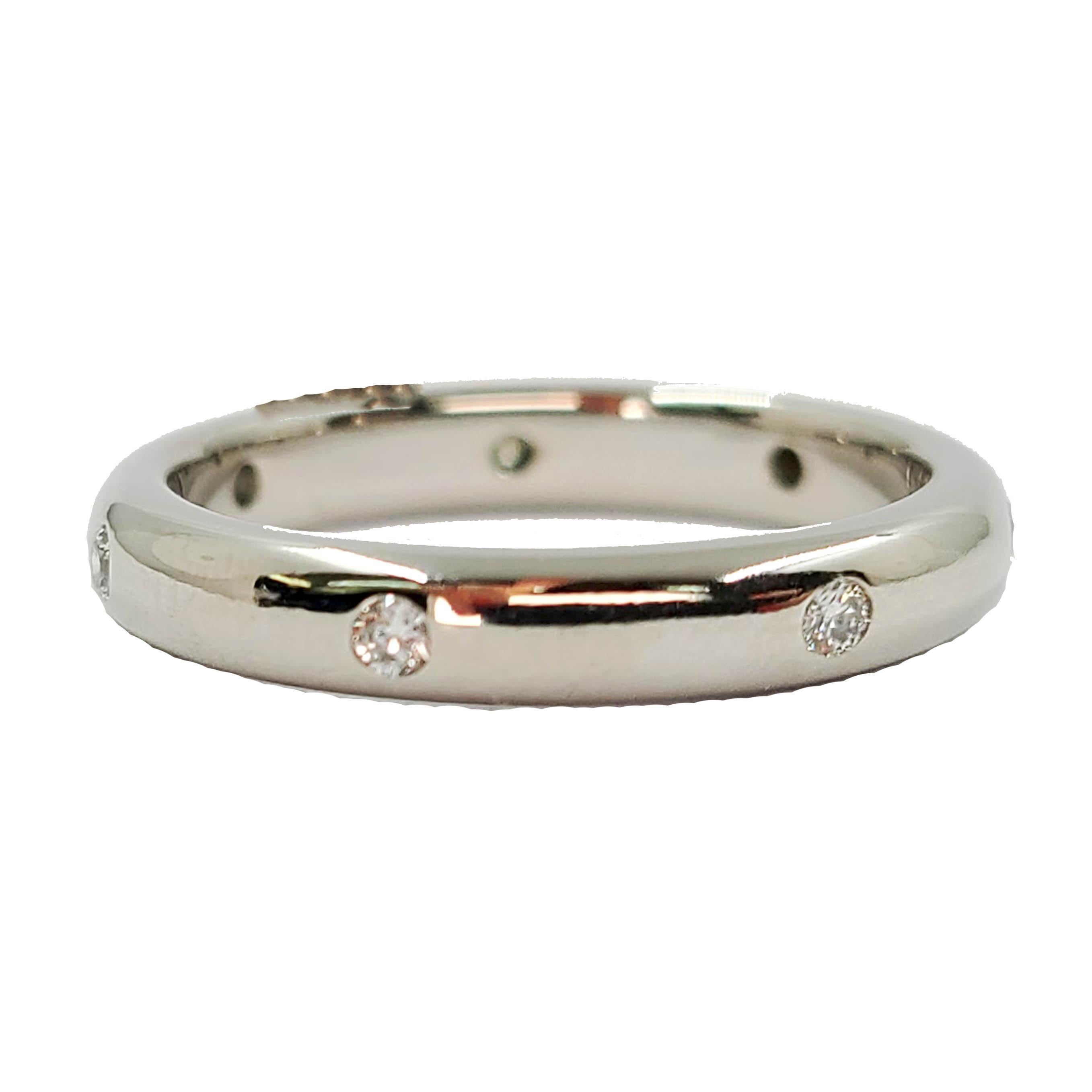 Platinum Diamond Band Featuring 7 Round Diamonds Totaling Approximately 0.10 Carat of VS Clarity & G Color That Extend Around Finger. Finished Weight is 5.9 Grams. Finger Size 5.75.