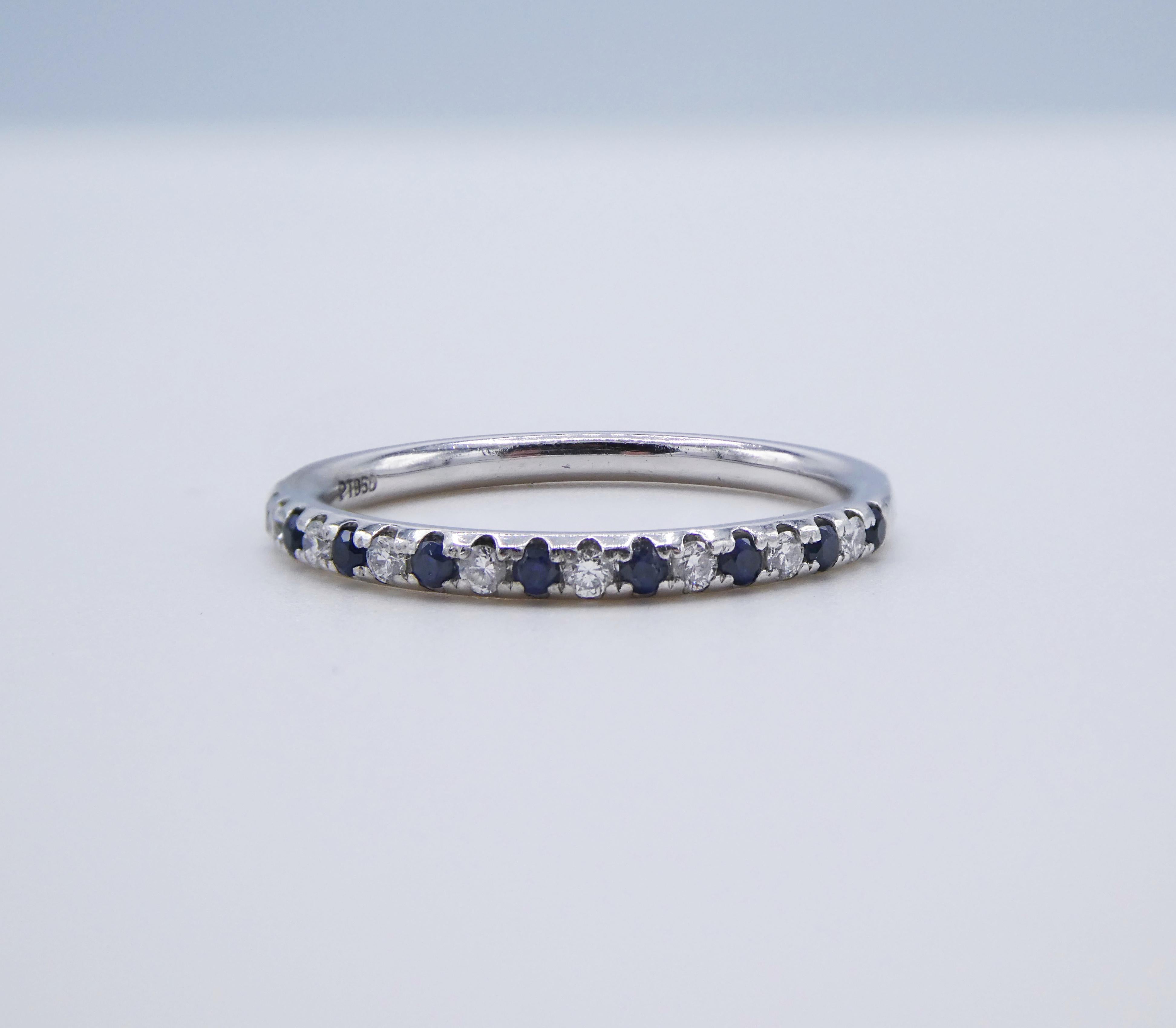 Platinum Natural Diamond & Blue Sapphire Wedding Band Ring Size 7
Metal: Platinum PT950
Weight: 3.25 grams
Diamonds: .10 CTW G VS natural diamonds
Band is 2mm wide
Size: 7 (US)
Blue Nile hallmark