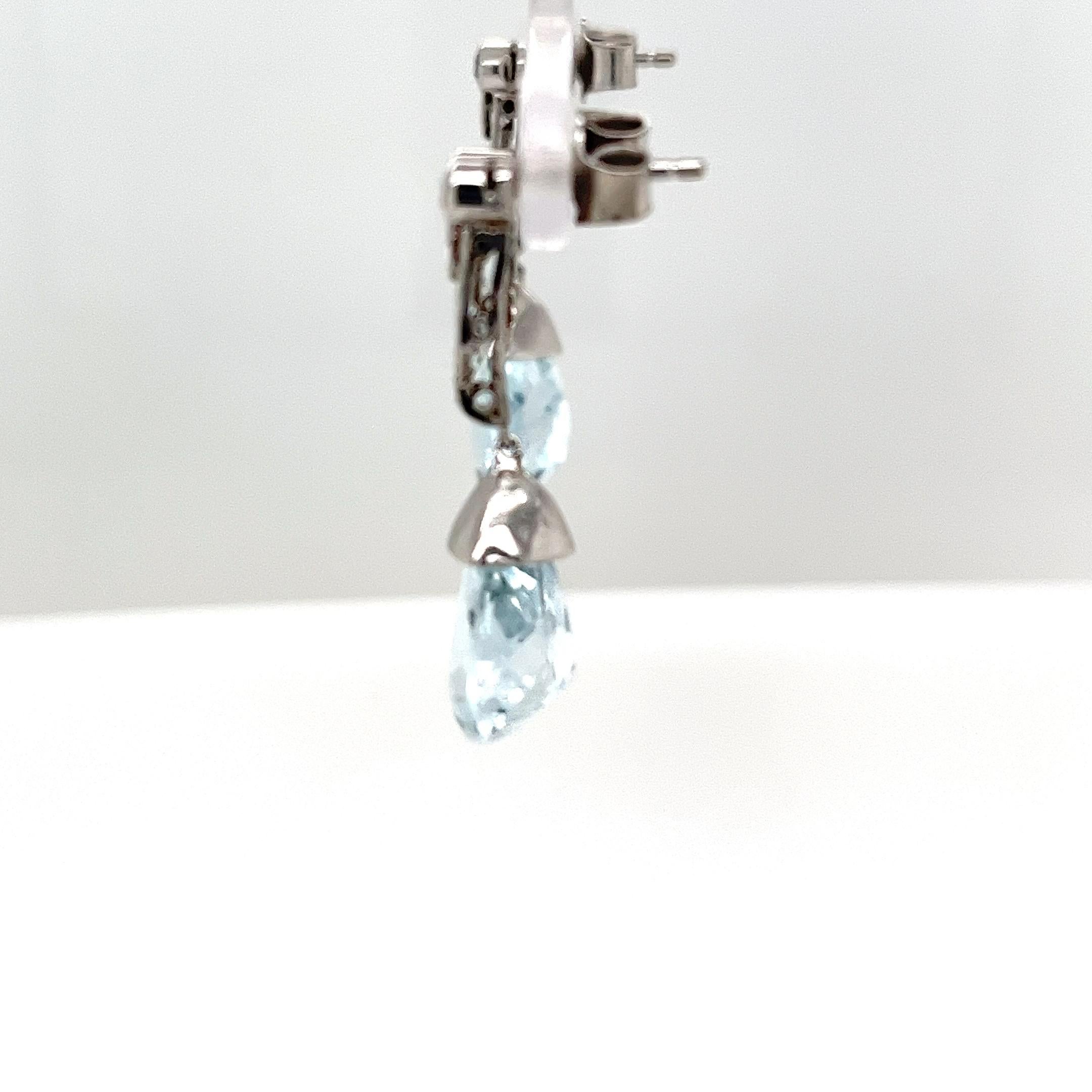 Donna Orecchini in platino con diamanti e topazio blu in vendita