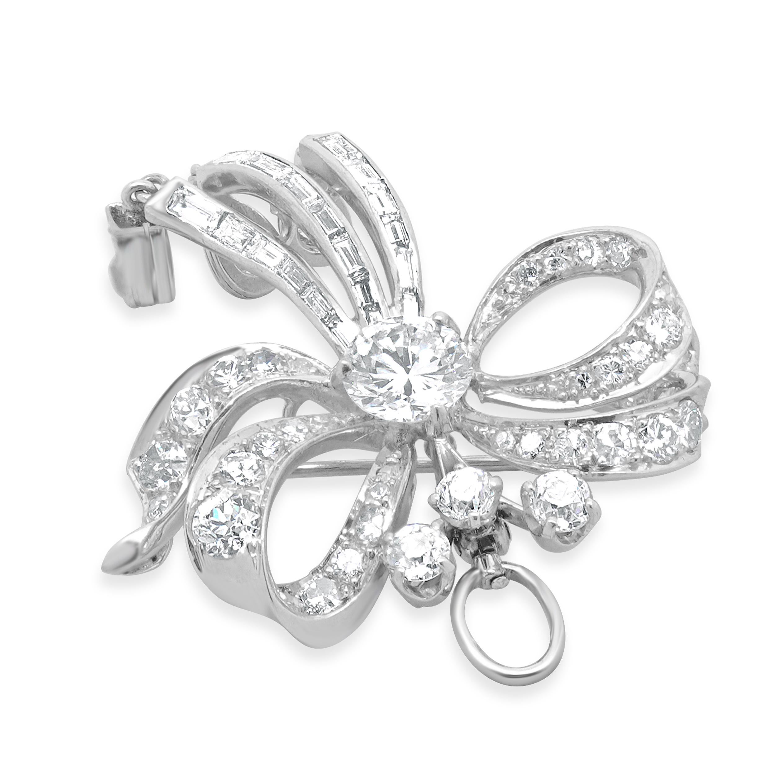 Designer: custom design
Material: platinum
Center Diamond: round cut = 1.25cttw
Color: G
Clarity: VS1
Diamonds: 61 round cut = 2.30cttw
Color: H
Clarity: SI1
Weight: 13.54 grams