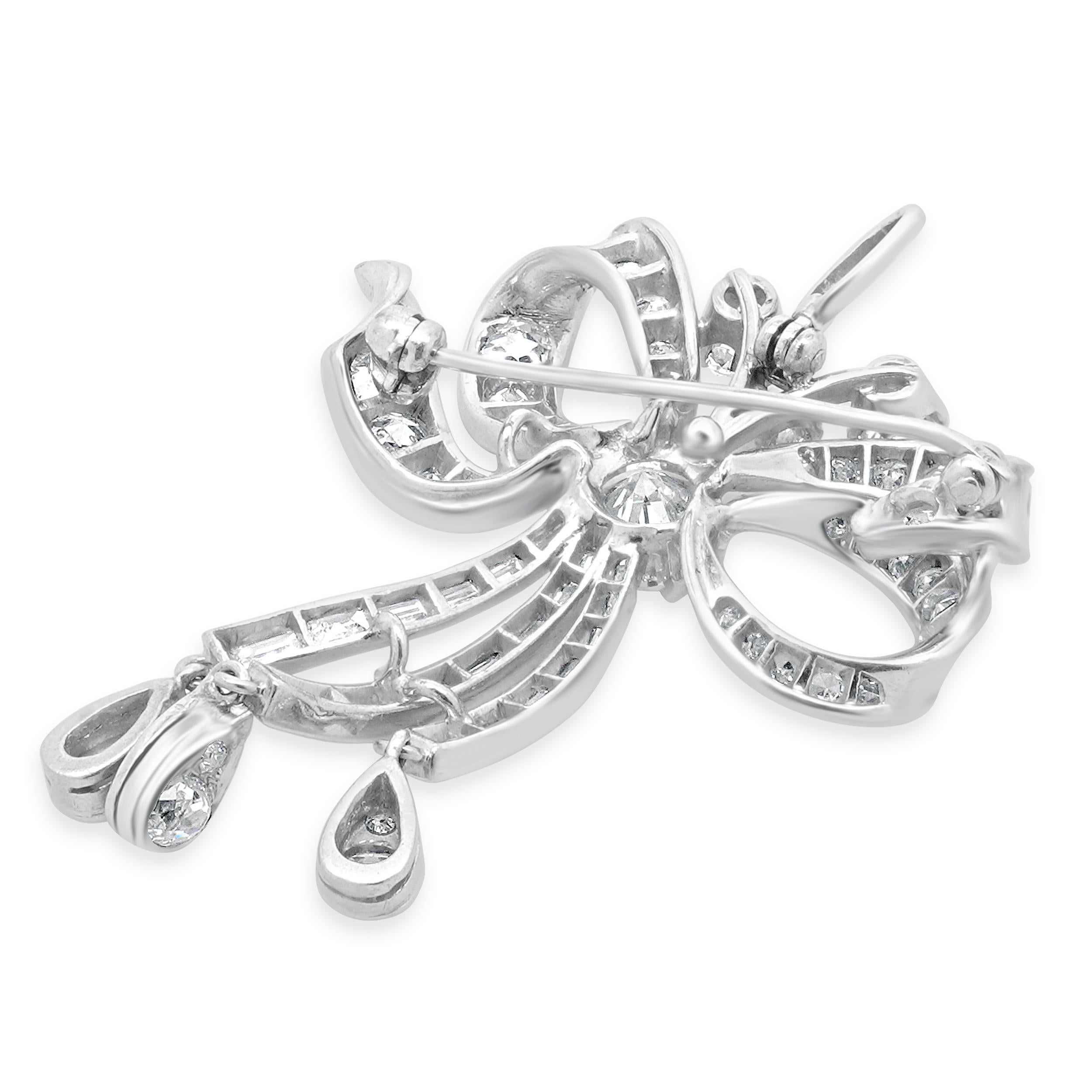Round Cut Platinum Diamond Bow Pin For Sale