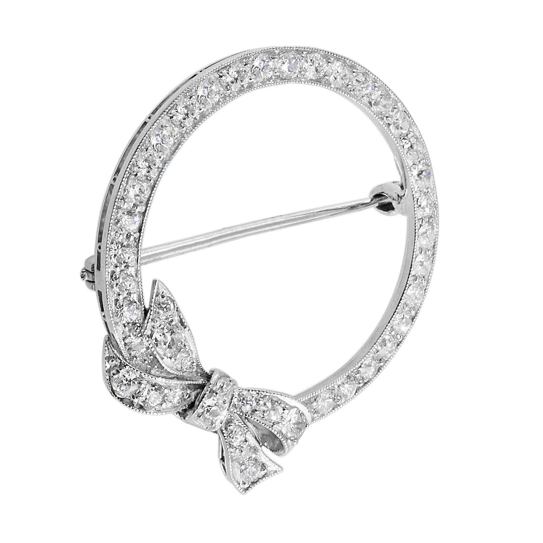 Round Cut Platinum Diamond Bow Round Brooch For Sale