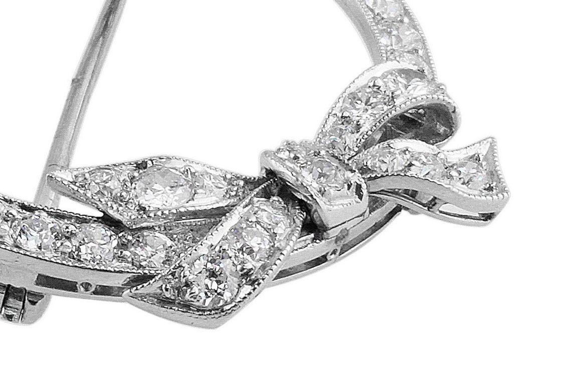 Platinum Diamond Bow Round Brooch In Excellent Condition For Sale In La Jolla, CA