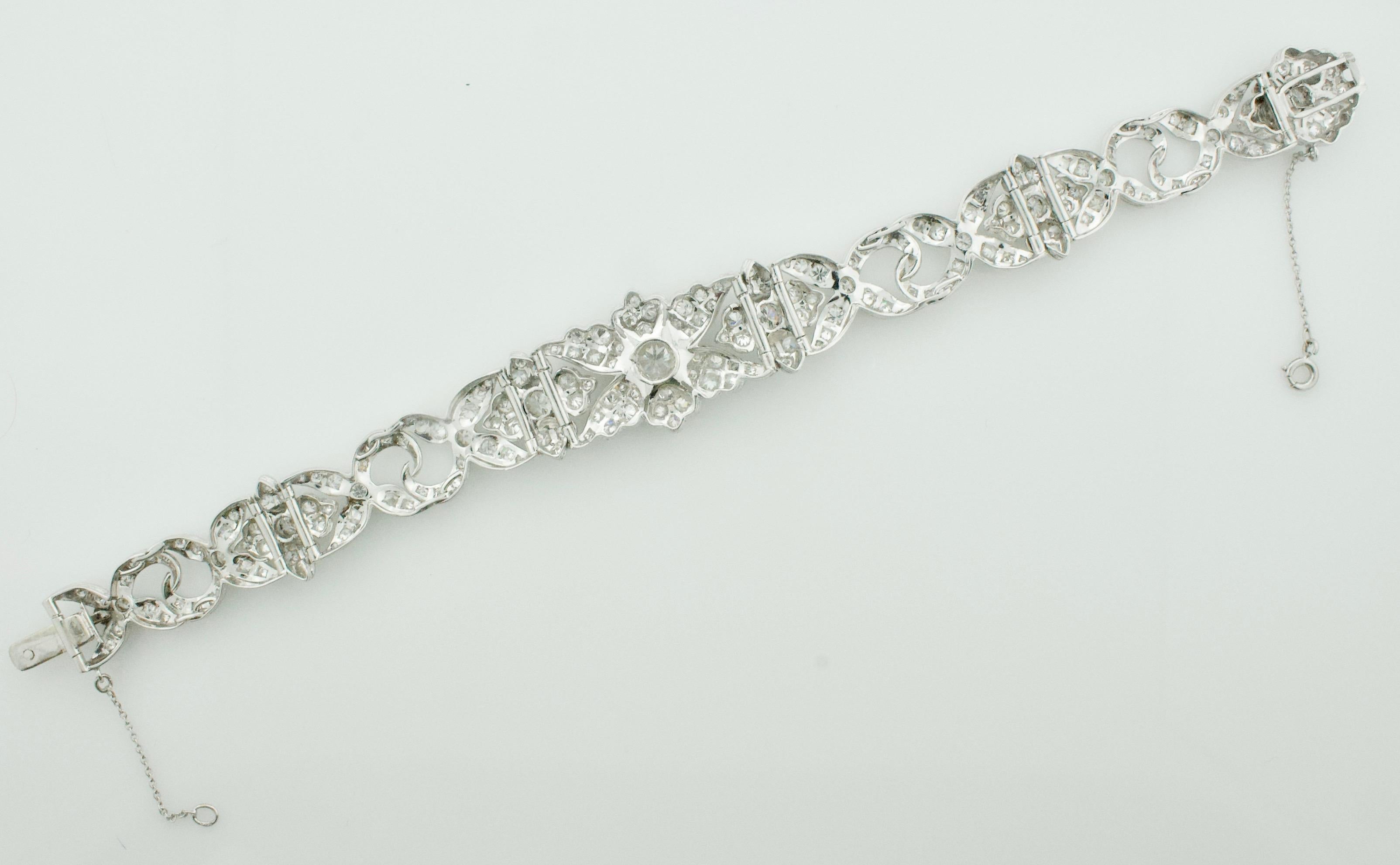 Platinum Diamond Bracelet Circa 1940's 4.40 carats
One  Round Brilliant Cut Diamonds weighing .45 carats approximately [GH SI] [bright with no imperfections visible to the naked eye]
Five Round Brilliant Cut Diamonds weighing .70 carats