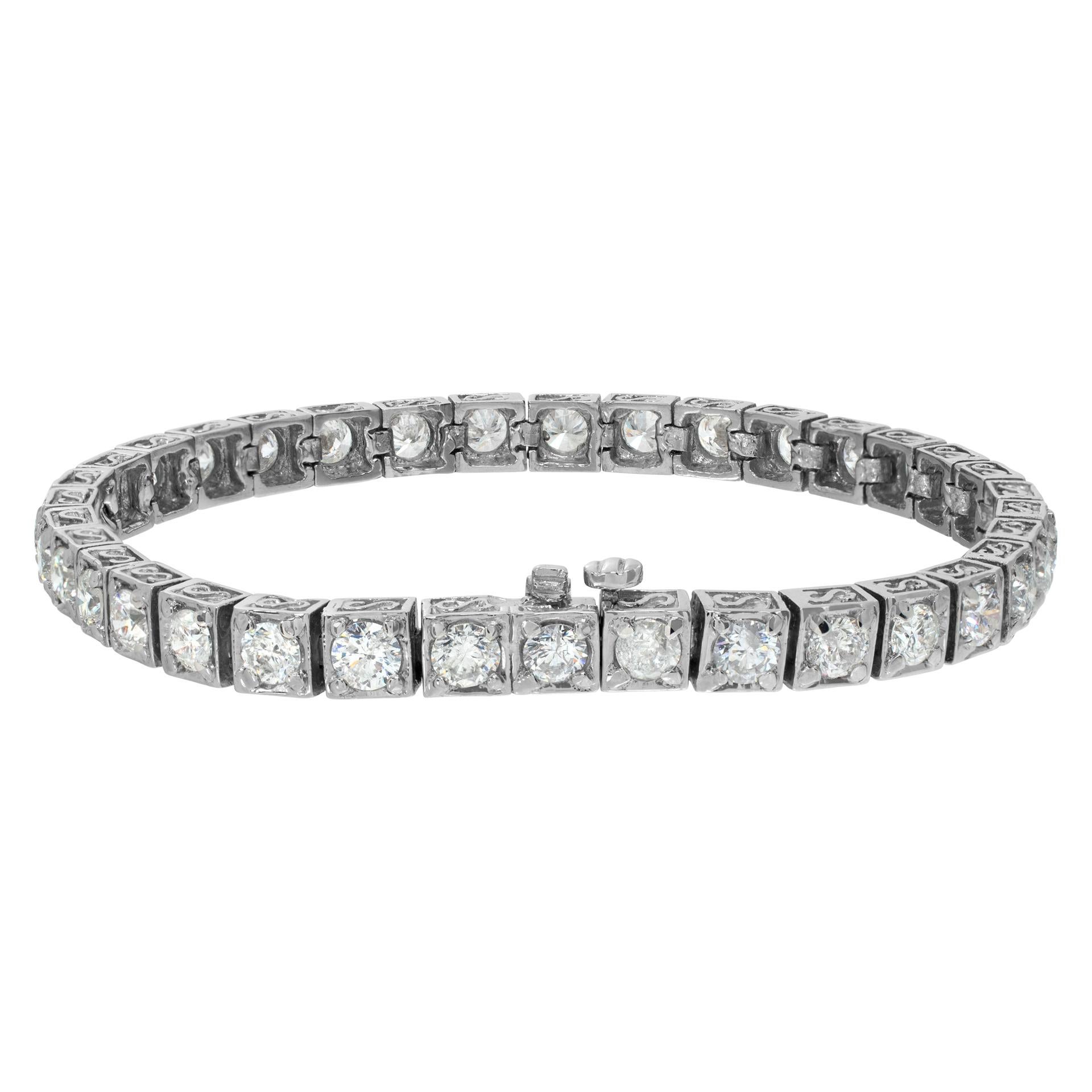 Platinum diamond bracelet w/ round brilliant cut diamonds set in 4 prong setting In Excellent Condition For Sale In Surfside, FL