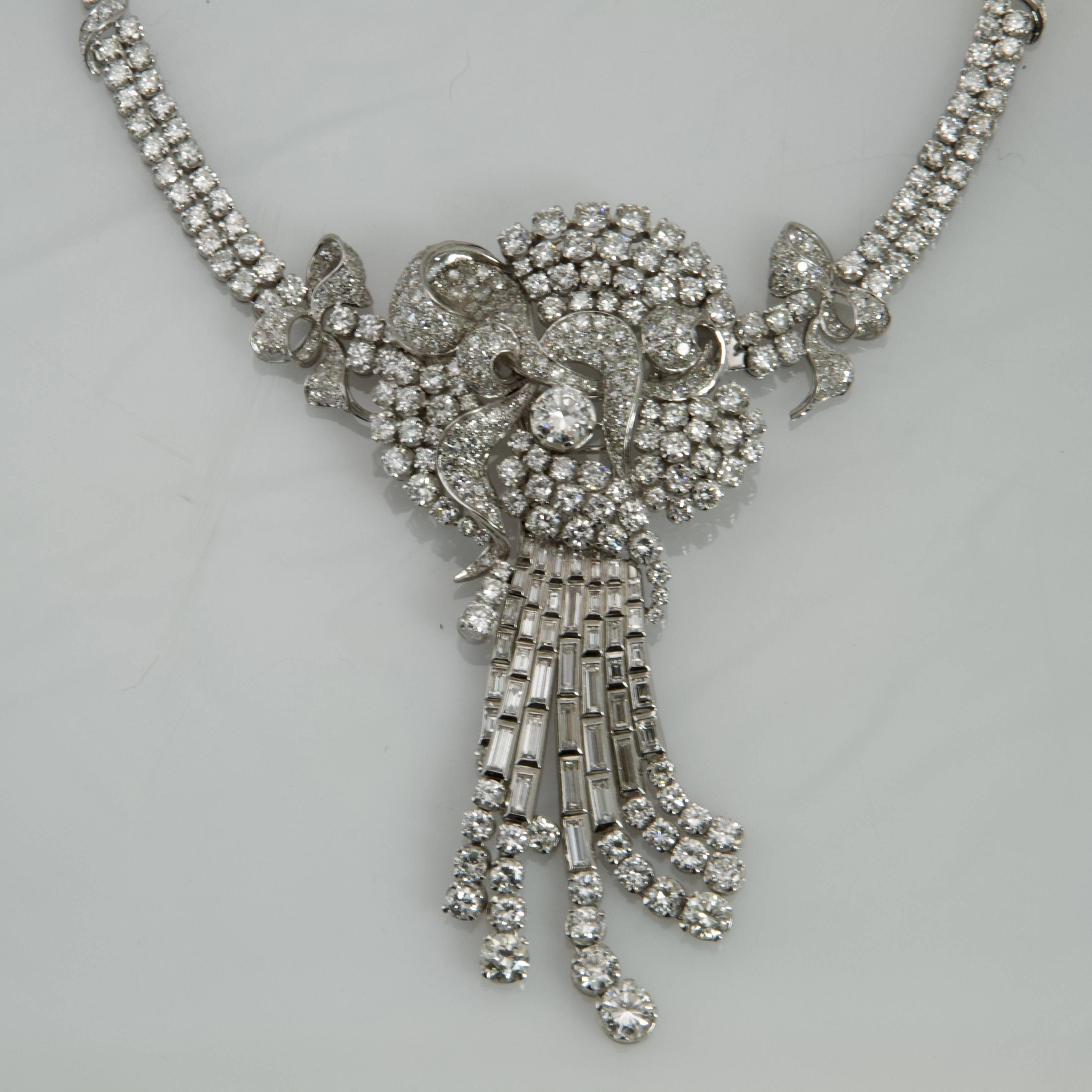 Platinum and white gold adjustable necklace. Audacious work offering a very impressive pendant necklace or a waterfall brooch. Dancing 