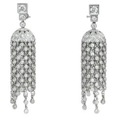 Orecchini di diamanti in platino con lampadario e nappina